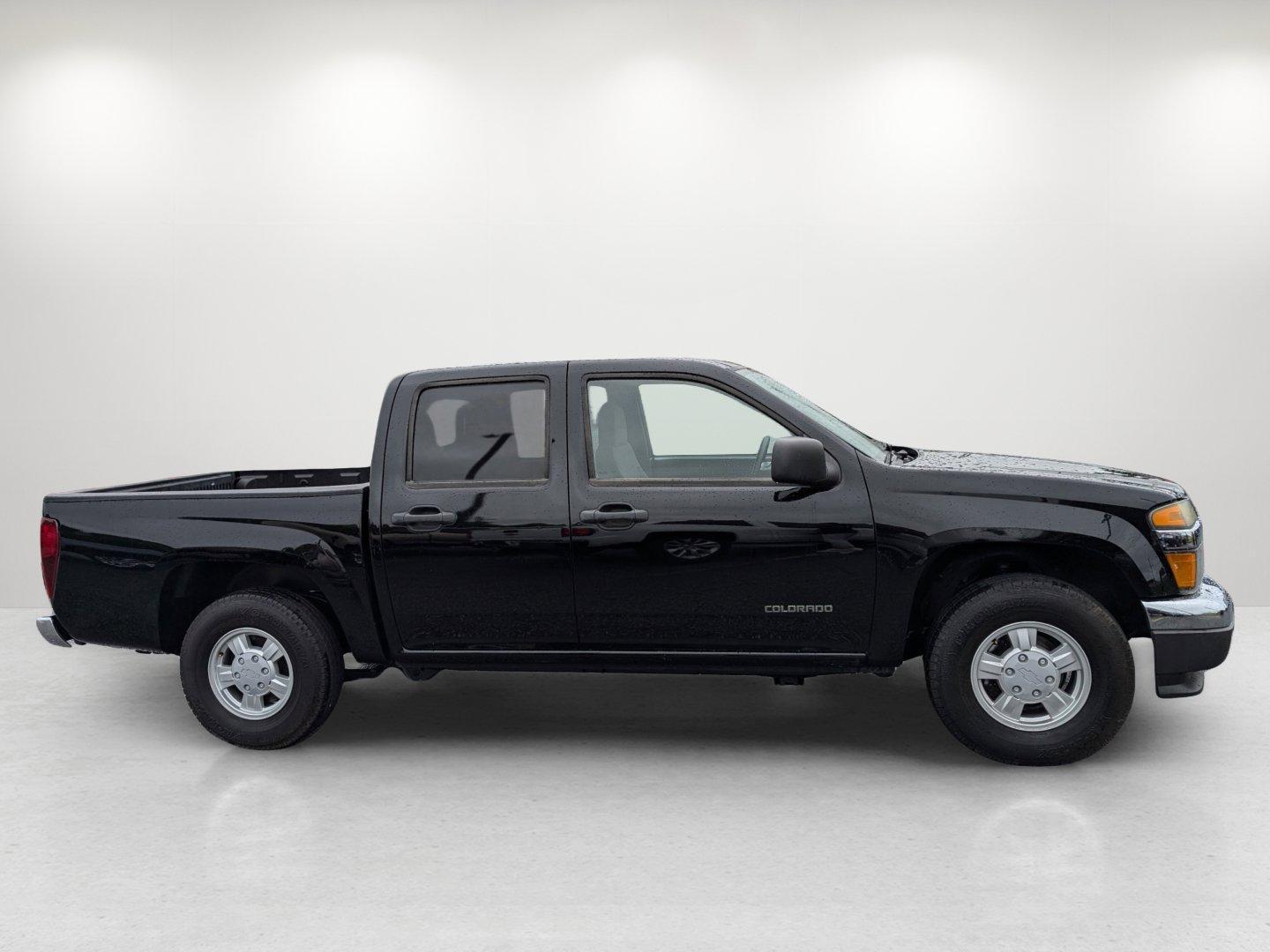 2004 /Very Dark Pewter Chevrolet Colorado (1GCCS136148) with an Gas I5 3.5L/211 engine, 4-Speed Automatic w/OD transmission, located at 3959 U.S. 80 W, Phenix City, AL, 36870, (334) 297-4885, 32.469296, -85.135185 - 2004 Chevrolet Colorado - Photo#4
