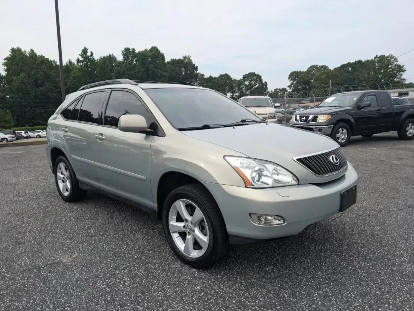 2005 Lexus RX 330 (2T2HA31U45C) with an Other engine, located at 3959 U.S. 80 W, Phenix City, AL, 36870, (334) 297-4885, 32.469296, -85.135185 - **Experience the Freedom of Adventure with This 2005 Lexus RX 330 at Gils Auto!**<br /> <br /> Are you ready to elevate your driving experience and embark on new adventures? Whether you're navigating the bustling streets of Phenix City or heading out for a weekend getaway, the 2005 Lexus RX 330 is y - Photo#2