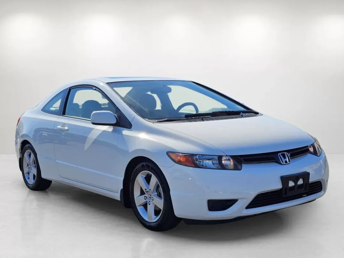 2006 Honda Civic Cpe EX (2HGFG12826H) with an Other engine, located at 1430 Gateway Drive, Opelika, AL, 36801, (334) 239-0944, 32.637871, -85.409790 - Unlock the freedom of the open road and elevate your everyday adventures with this remarkable 2006 Honda Civic Coupe, now available at Gils Auto in Prattville, AL. This stylish and efficient vehicle is perfect for budget-conscious buyers who crave reliability and a dash of sportiness in their daily - Photo#2