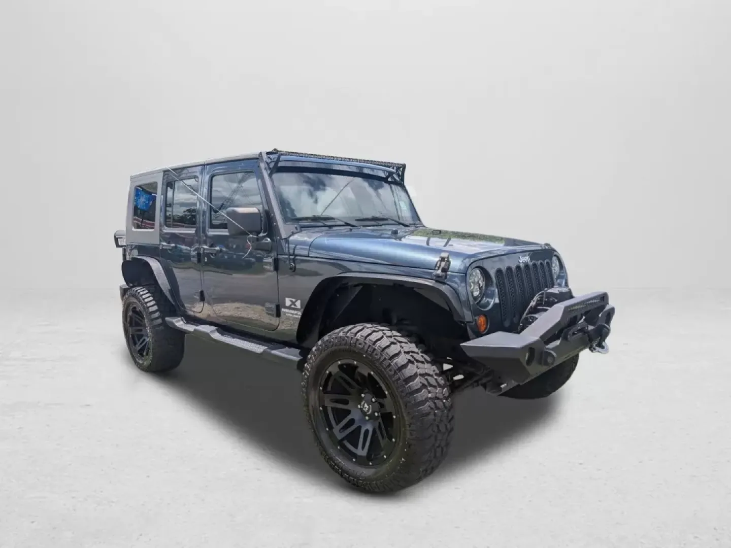 2008 /Dark/Medium Slate Gray Jeep Wrangler Unlimited X (1J4GA39168L) with an Other engine, located at 1430 Gateway Drive, Opelika, AL, 36801, (334) 239-0944, 32.637871, -85.409790 - **Adventure Awaits: Own the 2008 Jeep Wrangler Unlimited X Today!**<br /> <br /> Are you ready to break free from the mundane and embrace a lifestyle of adventure? Look no further than this stunning 2008 Jeep Wrangler Unlimited X, available now at Gils Auto in Phenix City, AL. Whether you're navigat - Photo#2