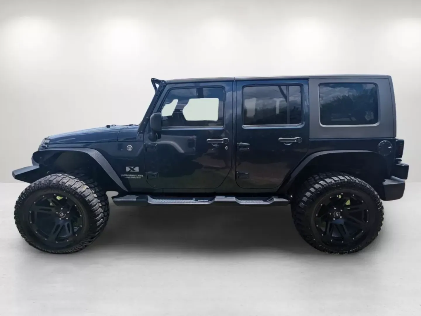 2008 /Dark/Medium Slate Gray Jeep Wrangler Unlimited X (1J4GA39168L) with an Other engine, located at 1430 Gateway Drive, Opelika, AL, 36801, (334) 239-0944, 32.637871, -85.409790 - **Adventure Awaits: Own the 2008 Jeep Wrangler Unlimited X Today!**<br /> <br /> Are you ready to break free from the mundane and embrace a lifestyle of adventure? Look no further than this stunning 2008 Jeep Wrangler Unlimited X, available now at Gils Auto in Phenix City, AL. Whether you're navigat - Photo#6