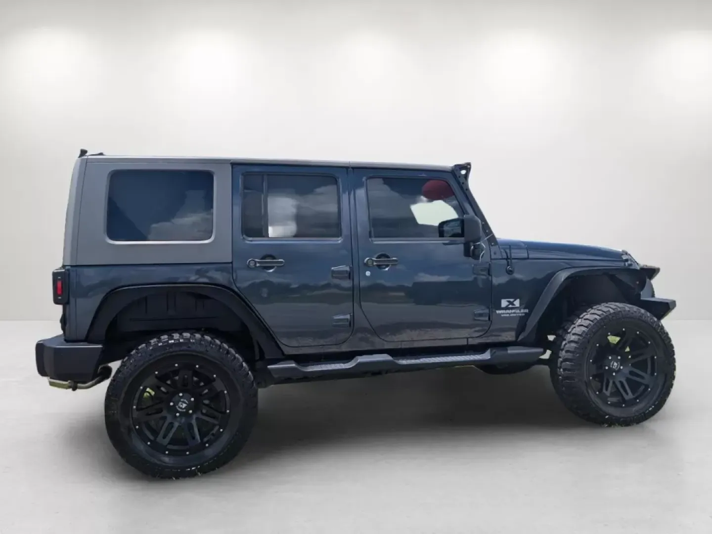 2008 /Dark/Medium Slate Gray Jeep Wrangler Unlimited X (1J4GA39168L) with an Other engine, located at 1430 Gateway Drive, Opelika, AL, 36801, (334) 239-0944, 32.637871, -85.409790 - **Adventure Awaits: Own the 2008 Jeep Wrangler Unlimited X Today!**<br /> <br /> Are you ready to break free from the mundane and embrace a lifestyle of adventure? Look no further than this stunning 2008 Jeep Wrangler Unlimited X, available now at Gils Auto in Phenix City, AL. Whether you're navigat - Photo#7