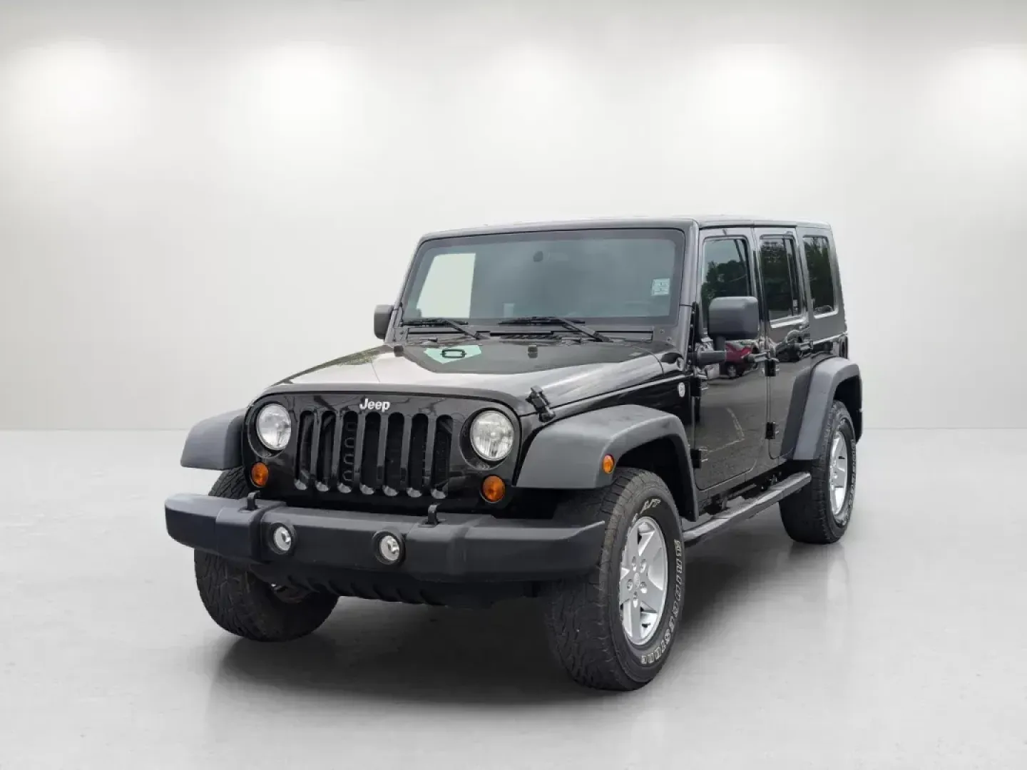 2010 /Dark Slate Gray/Medium Slate Gray Jeep Wrangler Unlimited Sport (1J4BA3H18AL) with an Gas V6 3.8L/231 engine, 4-Speed Automatic transmission, located at 3959 U.S. 80 W, Phenix City, AL, 36870, (334) 297-4885, 32.469296, -85.135185 - 2010 Jeep Wrangler Unlimited Sport - Photo#0