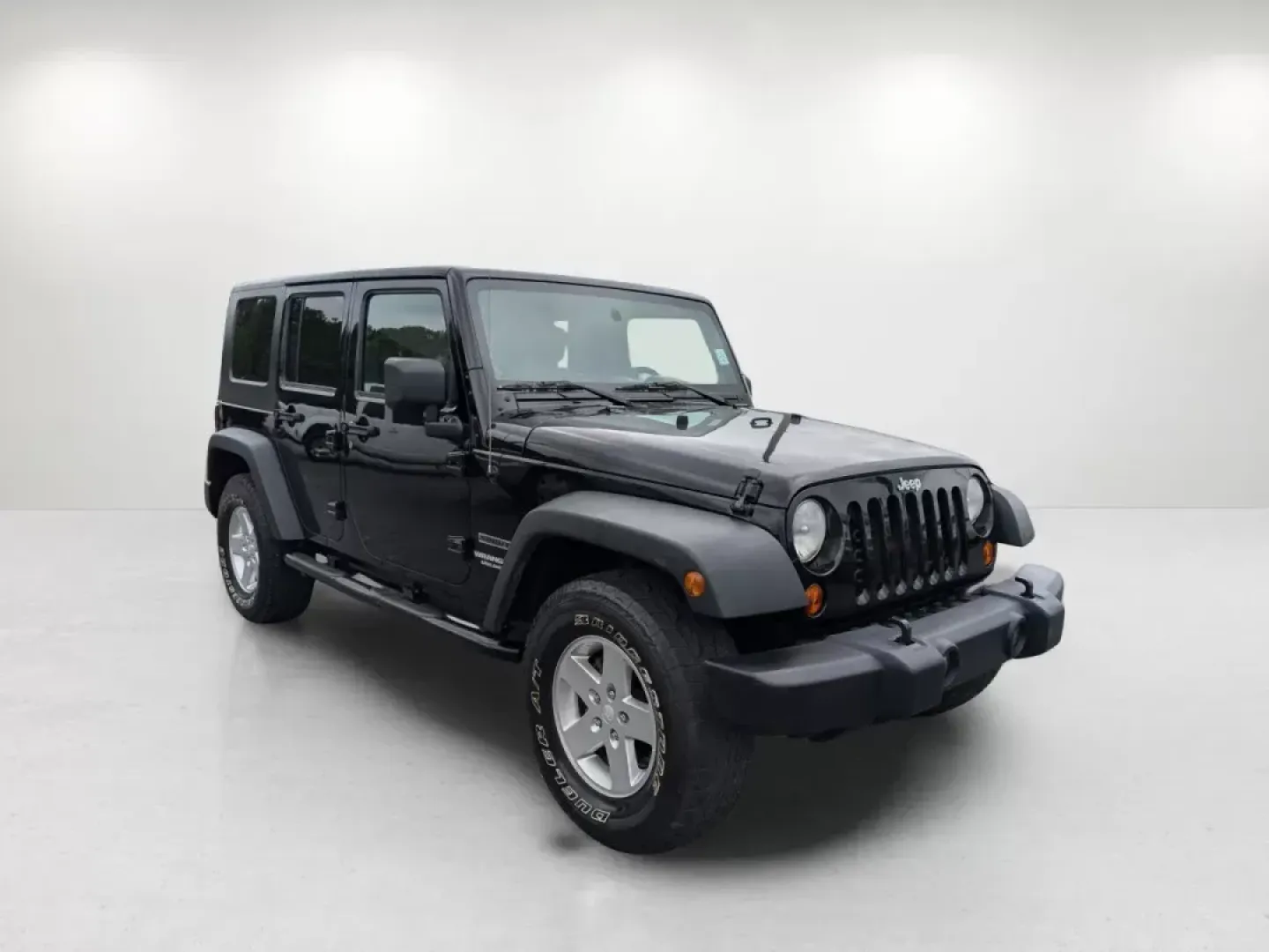 2010 /Dark Slate Gray/Medium Slate Gray Jeep Wrangler Unlimited Sport (1J4BA3H18AL) with an Gas V6 3.8L/231 engine, 4-Speed Automatic transmission, located at 3959 U.S. 80 W, Phenix City, AL, 36870, (334) 297-4885, 32.469296, -85.135185 - 2010 Jeep Wrangler Unlimited Sport - Photo#2