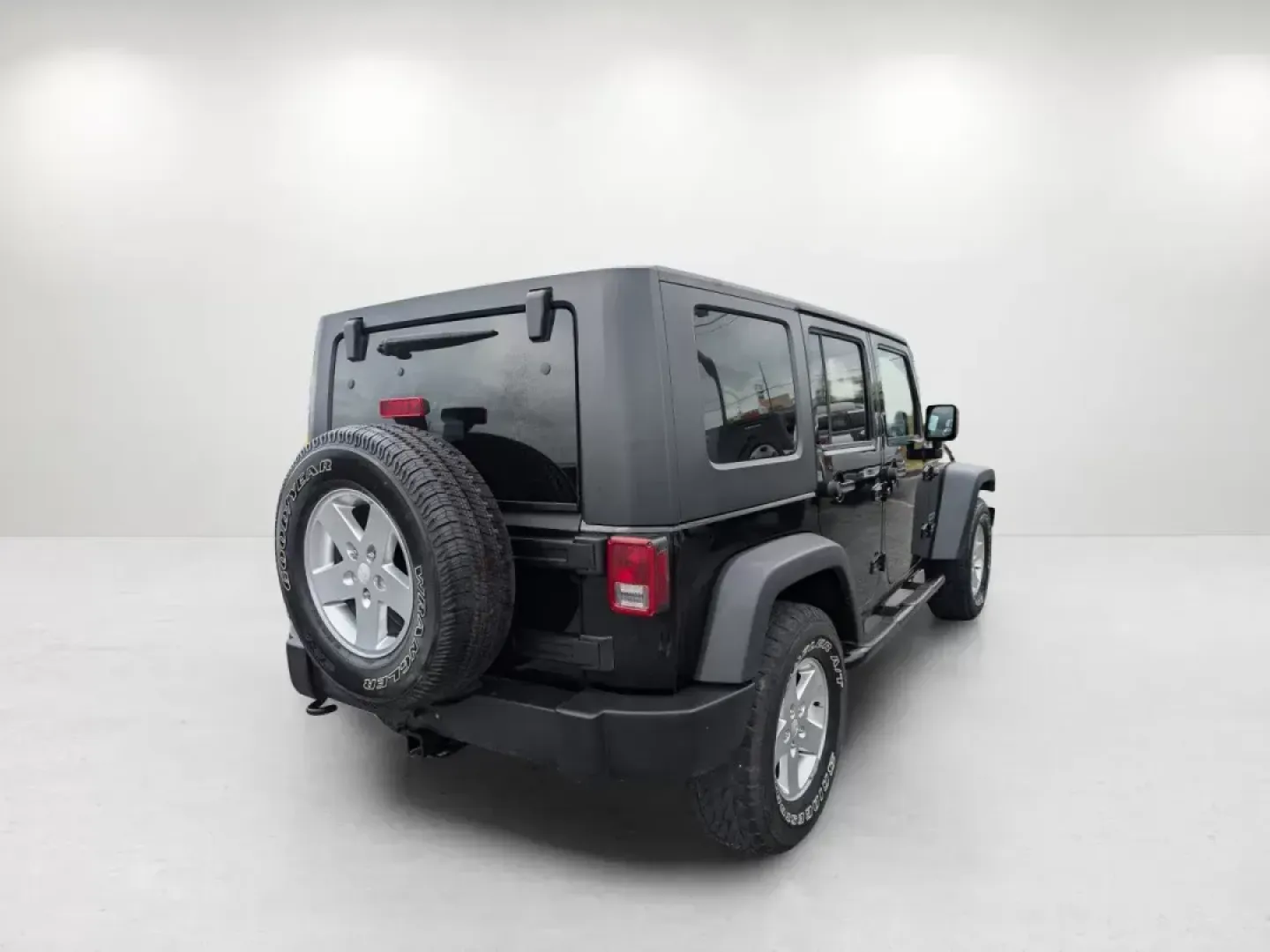 2010 /Dark Slate Gray/Medium Slate Gray Jeep Wrangler Unlimited Sport (1J4BA3H18AL) with an Gas V6 3.8L/231 engine, 4-Speed Automatic transmission, located at 3959 U.S. 80 W, Phenix City, AL, 36870, (334) 297-4885, 32.469296, -85.135185 - 2010 Jeep Wrangler Unlimited Sport - Photo#4