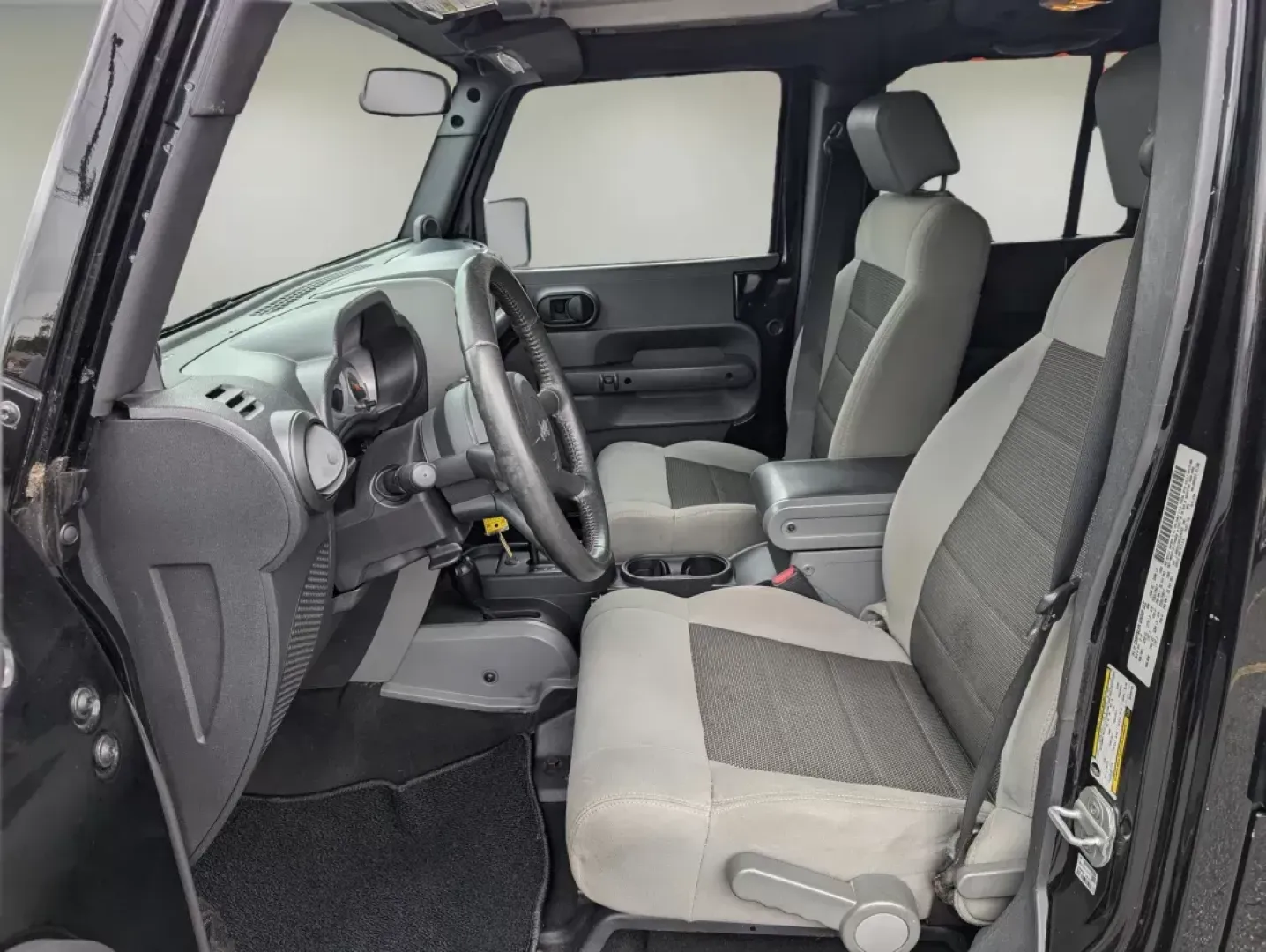 2010 /Dark Slate Gray/Medium Slate Gray Jeep Wrangler Unlimited Sport (1J4BA3H18AL) with an Gas V6 3.8L/231 engine, 4-Speed Automatic transmission, located at 3959 U.S. 80 W, Phenix City, AL, 36870, (334) 297-4885, 32.469296, -85.135185 - 2010 Jeep Wrangler Unlimited Sport - Photo#10