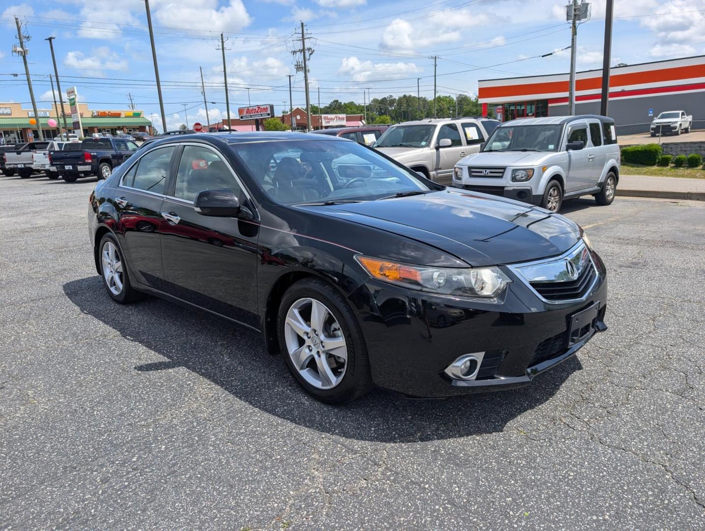 2011 Acura TSX (JH4CU2F66BC) with an Gas I4 2.4L/144 engine, 5-Speed Automatic transmission, located at 3959 U.S. 80 W, Phenix City, AL, 36870, (334) 297-4885, 32.469296, -85.135185 - 2011 Acura TSX - Photo#2