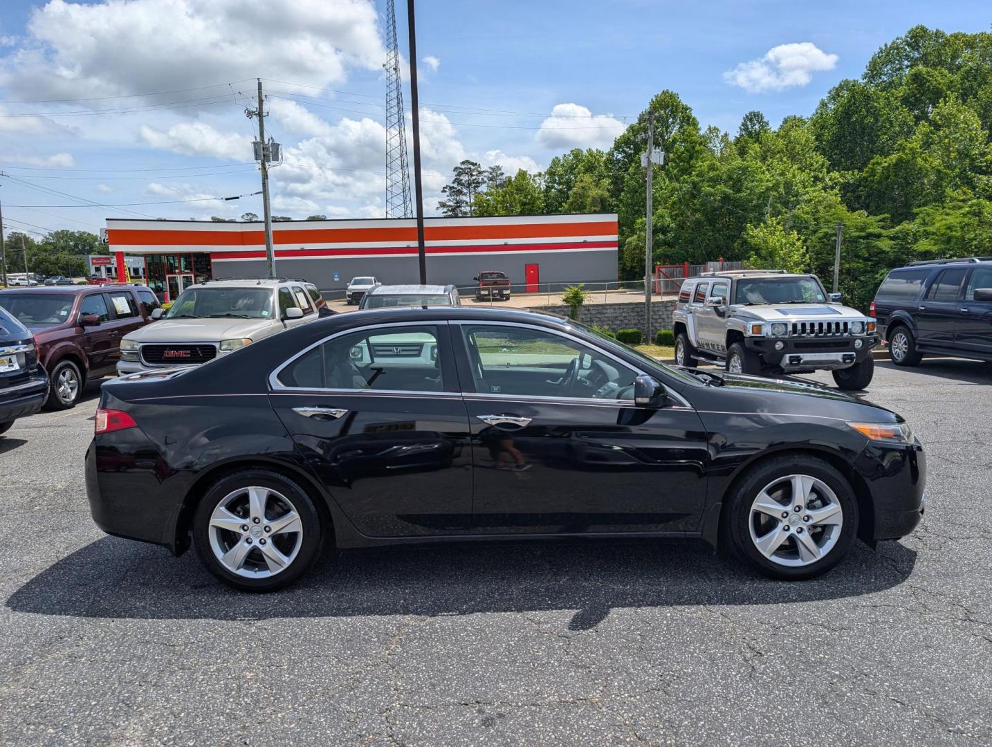 2011 Acura TSX (JH4CU2F66BC) with an Gas I4 2.4L/144 engine, 5-Speed Automatic transmission, located at 3959 U.S. 80 W, Phenix City, AL, 36870, (334) 297-4885, 32.469296, -85.135185 - 2011 Acura TSX - Photo#3