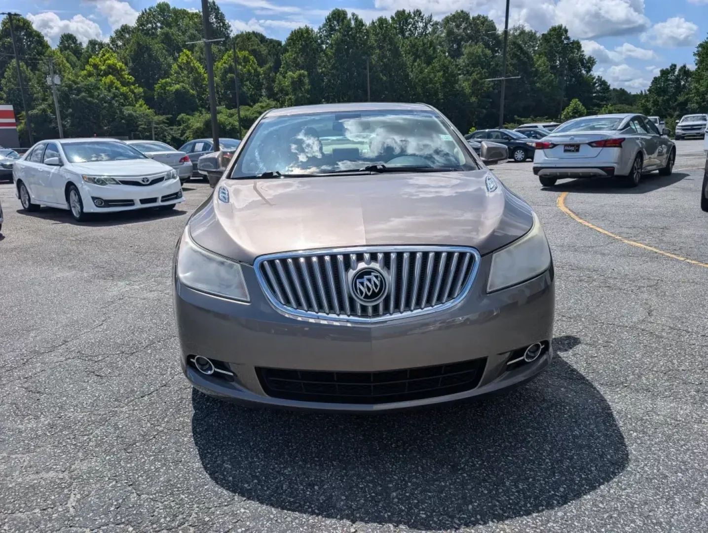 2012 /Cashmere Buick LaCrosse Leather (1G4GC5G36CF) with an Other engine, located at 3959 U.S. 80 W, Phenix City, AL, 36870, (334) 297-4885, 32.469296, -85.135185 - **Discover Your Next Adventure with the 2012 Buick LaCrosse at Gils Auto!**<br /> <br /> Are you ready to elevate your driving experience? Whether you're commuting to work, shuttling the kids to soccer practice, or planning a weekend getaway, the 2012 Buick LaCrosse is the perfect companion for ever - Photo#1