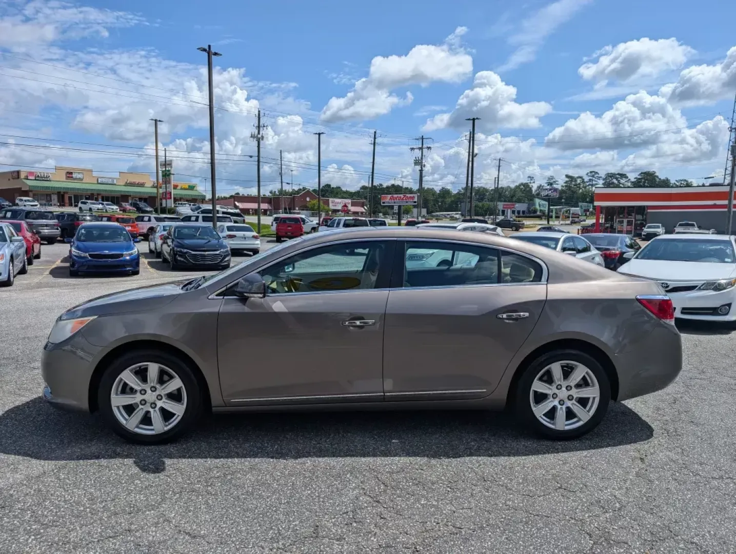 2012 /Cashmere Buick LaCrosse Leather (1G4GC5G36CF) with an Other engine, located at 3959 U.S. 80 W, Phenix City, AL, 36870, (334) 297-4885, 32.469296, -85.135185 - **Discover Your Next Adventure with the 2012 Buick LaCrosse at Gils Auto!**<br /> <br /> Are you ready to elevate your driving experience? Whether you're commuting to work, shuttling the kids to soccer practice, or planning a weekend getaway, the 2012 Buick LaCrosse is the perfect companion for ever - Photo#7