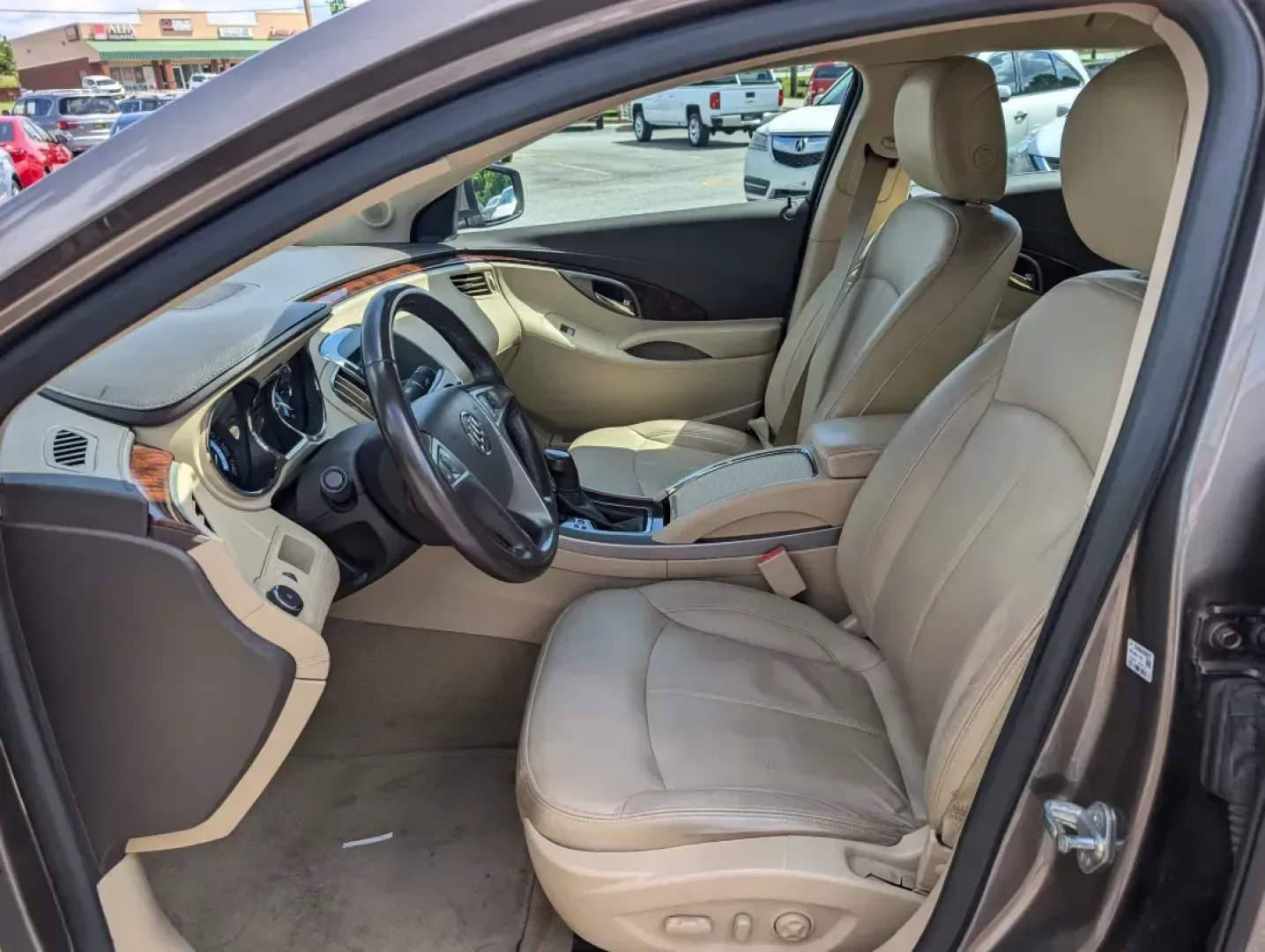 2012 /Cashmere Buick LaCrosse Leather (1G4GC5G36CF) with an Other engine, located at 3959 U.S. 80 W, Phenix City, AL, 36870, (334) 297-4885, 32.469296, -85.135185 - **Discover Your Next Adventure with the 2012 Buick LaCrosse at Gils Auto!**<br /> <br /> Are you ready to elevate your driving experience? Whether you're commuting to work, shuttling the kids to soccer practice, or planning a weekend getaway, the 2012 Buick LaCrosse is the perfect companion for ever - Photo#9