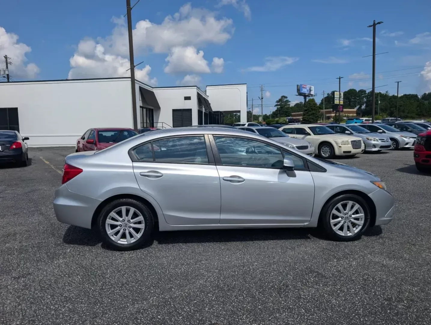 2012 Honda Civic Sdn EX (2HGFB2F87CH) with an Other engine, located at 3959 U.S. 80 W, Phenix City, AL, 36870, (334) 297-4885, 32.469296, -85.135185 - ### Discover Your Next Adventure with the 2012 Honda Civic EX at Gils Auto - Phenix City!<br /> <br /> Are you ready to elevate your daily commute or embark on weekend getaways? Look no further than the 2012 Honda Civic EX, a vehicle that seamlessly blends style, reliability, and outstanding fuel ef - Photo#3