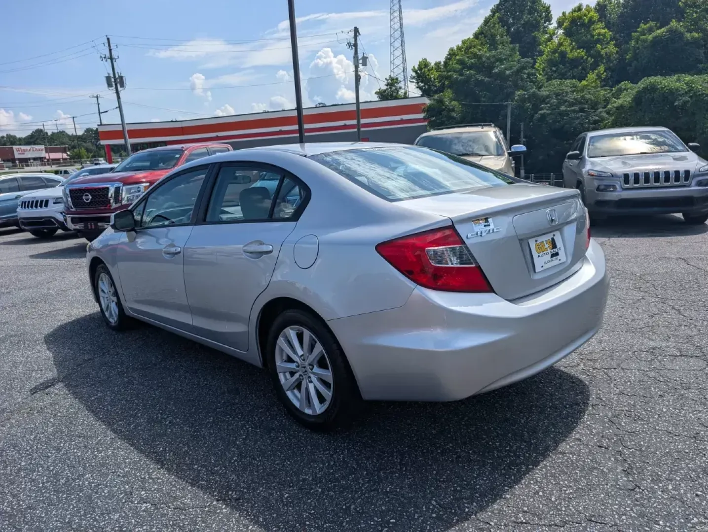 2012 Honda Civic Sdn EX (2HGFB2F87CH) with an Other engine, located at 3959 U.S. 80 W, Phenix City, AL, 36870, (334) 297-4885, 32.469296, -85.135185 - ### Discover Your Next Adventure with the 2012 Honda Civic EX at Gils Auto - Phenix City!<br /> <br /> Are you ready to elevate your daily commute or embark on weekend getaways? Look no further than the 2012 Honda Civic EX, a vehicle that seamlessly blends style, reliability, and outstanding fuel ef - Photo#6