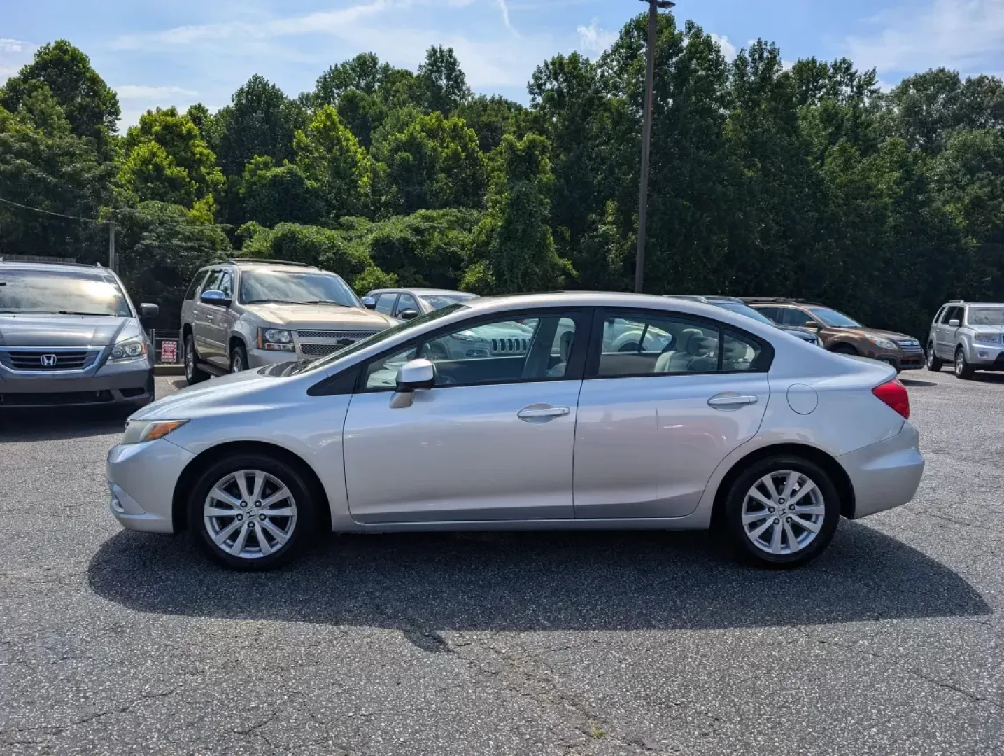 2012 Honda Civic Sdn EX (2HGFB2F87CH) with an Other engine, located at 3959 U.S. 80 W, Phenix City, AL, 36870, (334) 297-4885, 32.469296, -85.135185 - ### Discover Your Next Adventure with the 2012 Honda Civic EX at Gils Auto - Phenix City!<br /> <br /> Are you ready to elevate your daily commute or embark on weekend getaways? Look no further than the 2012 Honda Civic EX, a vehicle that seamlessly blends style, reliability, and outstanding fuel ef - Photo#7