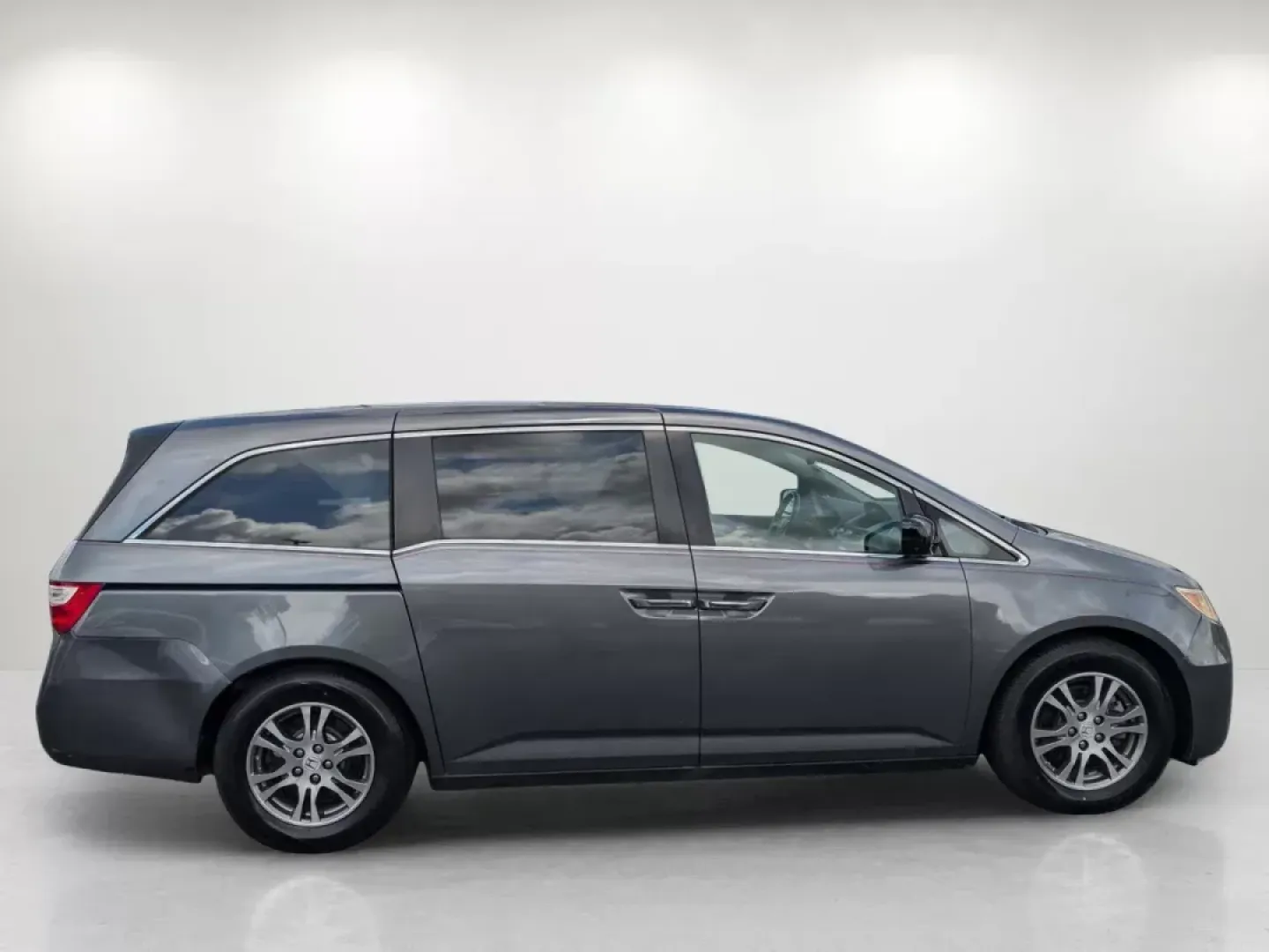 2012 Honda Odyssey EX-L (5FNRL5H68CB) with an Gas V6 3.5L/212 engine, 5-Speed Automatic transmission, located at 3959 U.S. 80 W, Phenix City, AL, 36870, (334) 297-4885, 32.469296, -85.135185 - **Discover the 2012 Honda Odyssey EX-L: Your Family's Next Adventure Awaits!**<br /> <br /> If you're on the lookout for a spacious, comfortable, and reliable vehicle that can effortlessly accommodate your family's needs, look no further than this stunning 2012 Honda Odyssey EX-L. Ideal for growing - Photo#3