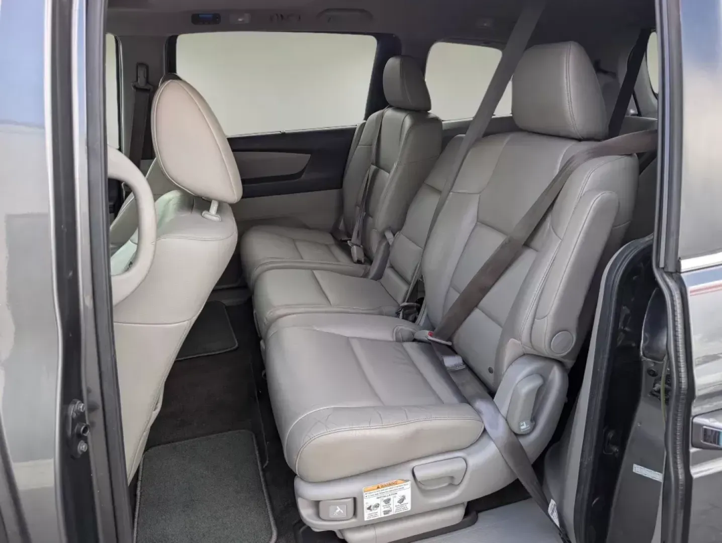 2012 Honda Odyssey EX-L (5FNRL5H68CB) with an Gas V6 3.5L/212 engine, 5-Speed Automatic transmission, located at 3959 U.S. 80 W, Phenix City, AL, 36870, (334) 297-4885, 32.469296, -85.135185 - **Discover the 2012 Honda Odyssey EX-L: Your Family's Next Adventure Awaits!**<br /> <br /> If you're on the lookout for a spacious, comfortable, and reliable vehicle that can effortlessly accommodate your family's needs, look no further than this stunning 2012 Honda Odyssey EX-L. Ideal for growing - Photo#10