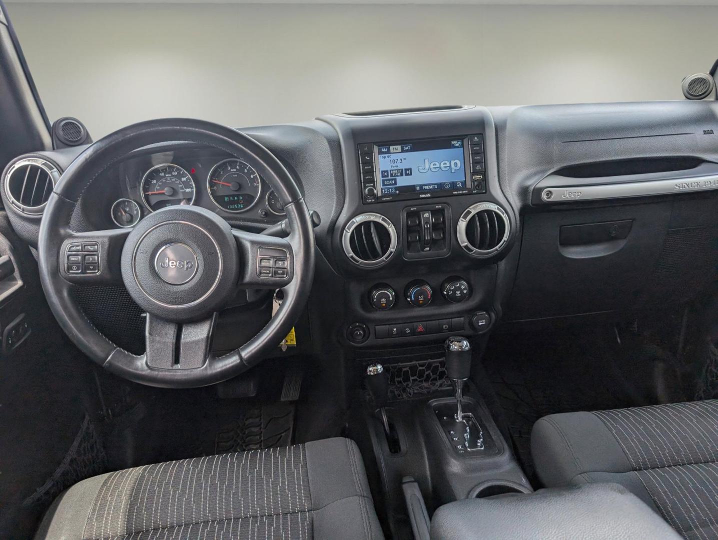 2012 Black /Black Interior Jeep Wrangler Unlimited Sahara (1C4BJWEG4CL) with an Gas V6 3.6L/220 engine, 5-Speed Automatic transmission, located at 804 22nd Ave, Phenix City, AL, 36870, (334) 297-1860, 32.484749, -85.024475 - 2012 Jeep Wrangler Unlimited Sahara - Photo#11