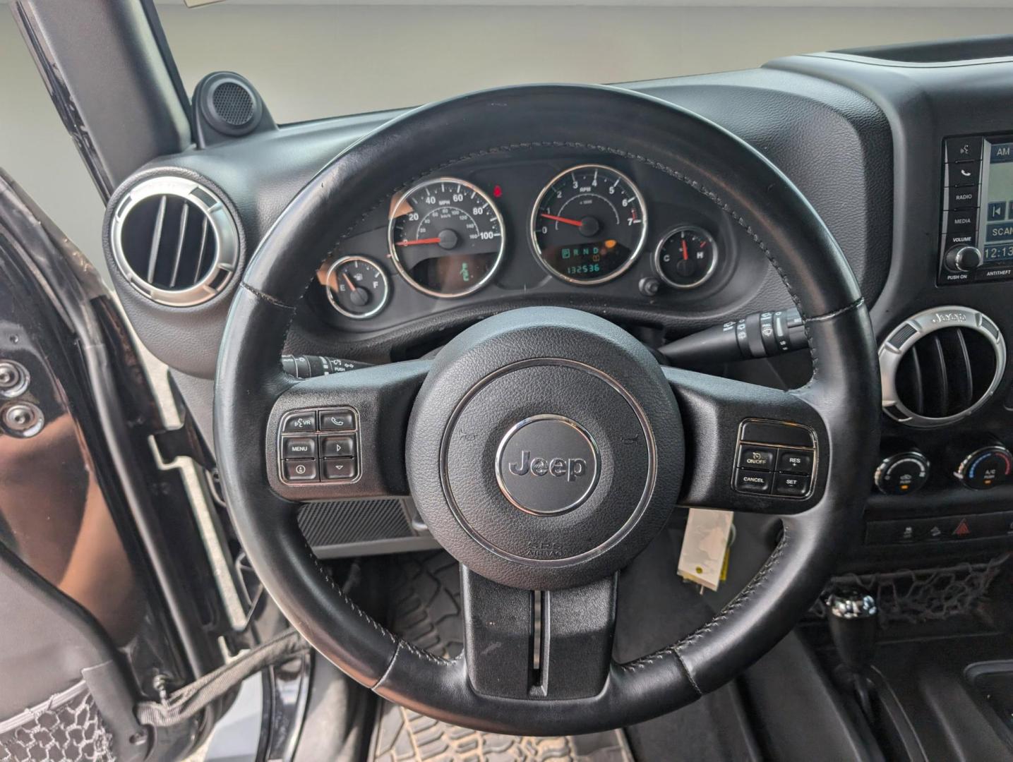 2012 Black /Black Interior Jeep Wrangler Unlimited Sahara (1C4BJWEG4CL) with an Gas V6 3.6L/220 engine, 5-Speed Automatic transmission, located at 804 22nd Ave, Phenix City, AL, 36870, (334) 297-1860, 32.484749, -85.024475 - 2012 Jeep Wrangler Unlimited Sahara - Photo#15