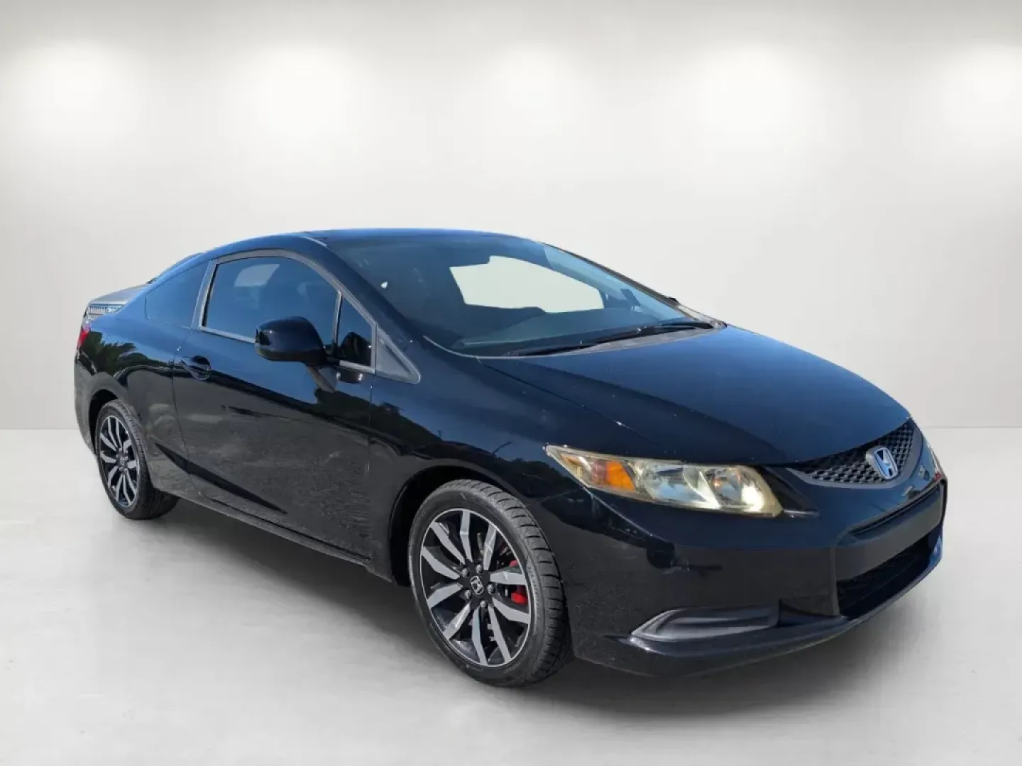 2013 Honda Civic Cpe LX (2HGFG3B57DH) with an Gas I4 1.8L/110 engine, 5-Speed Automatic transmission, located at 1430 Gateway Drive, Opelika, AL, 36801, (334) 239-0944, 32.637871, -85.409790 - 2013 Honda Civic Cpe LX - Photo#2