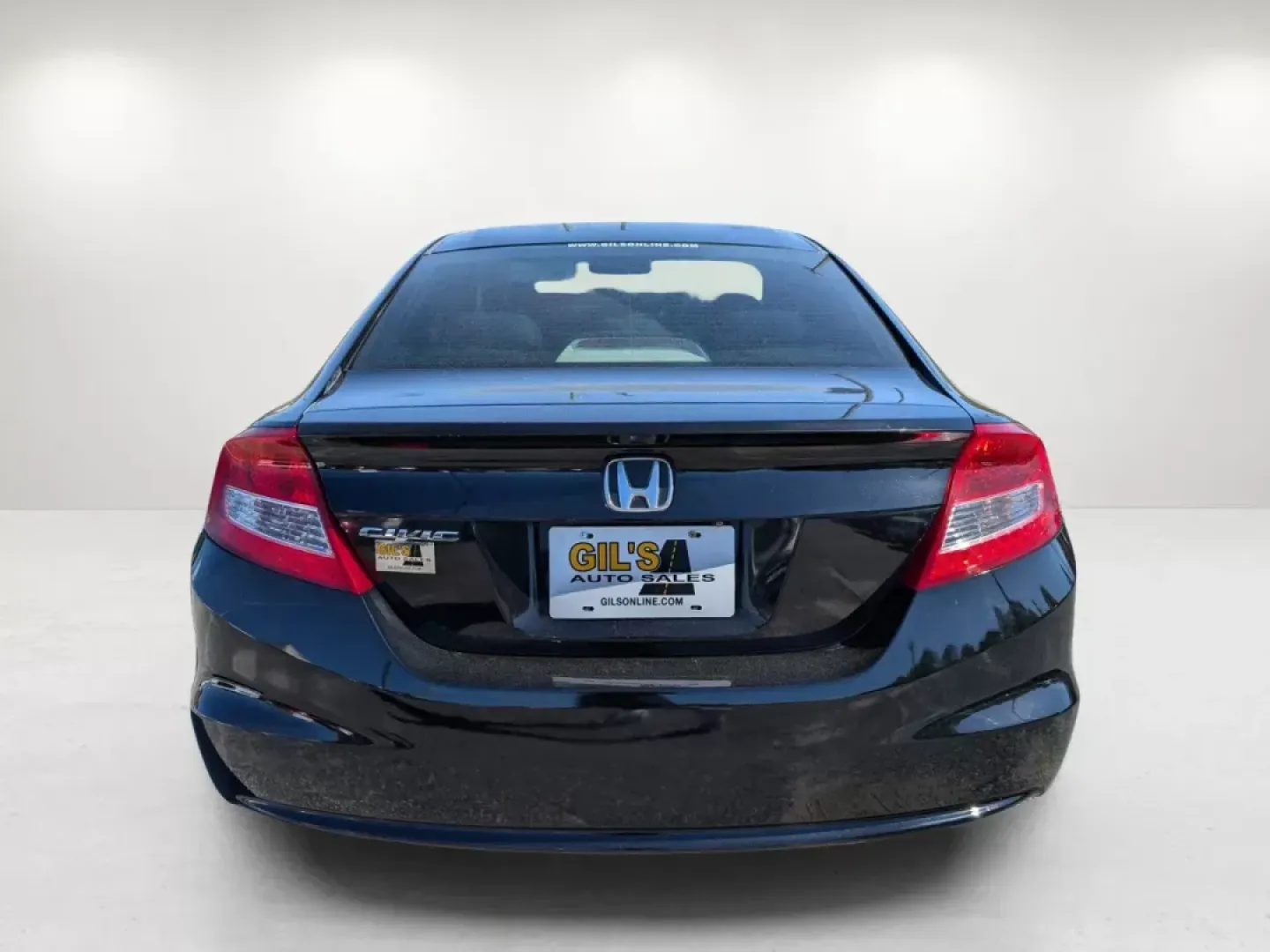 2013 Honda Civic Cpe LX (2HGFG3B57DH) with an Gas I4 1.8L/110 engine, 5-Speed Automatic transmission, located at 1430 Gateway Drive, Opelika, AL, 36801, (334) 239-0944, 32.637871, -85.409790 - 2013 Honda Civic Cpe LX - Photo#5