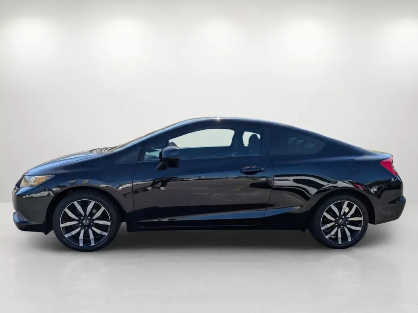 2013 Honda Civic Cpe LX (2HGFG3B57DH) with an Gas I4 1.8L/110 engine, 5-Speed Automatic transmission, located at 1430 Gateway Drive, Opelika, AL, 36801, (334) 239-0944, 32.637871, -85.409790 - 2013 Honda Civic Cpe LX - Photo#7