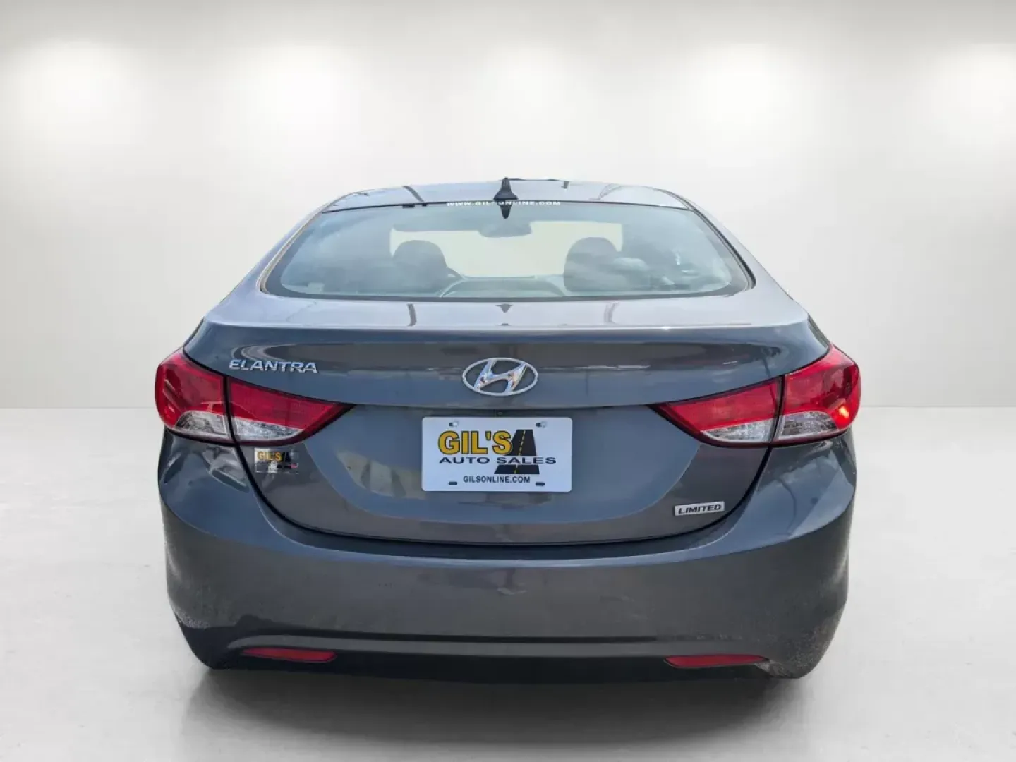 2013 /Gray Hyundai Elantra Limited (5NPDH4AE3DH) with an Gas I4 1.8L/110 engine, 6-Speed Automatic w/Manual Shift transmission, located at 1430 Gateway Drive, Opelika, AL, 36801, (334) 239-0944, 32.637871, -85.409790 - 2013 Hyundai Elantra Limited - Photo#2