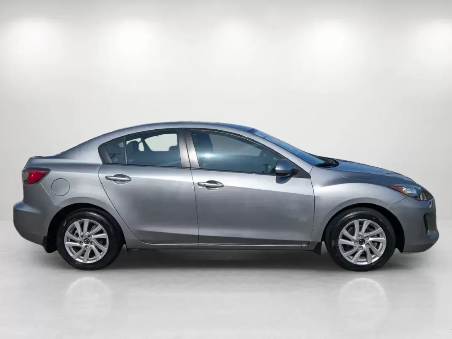 2013 Mazda Mazda3 i Grand Touring (JM1BL1W73D1) with an Gas I4 2.0L/122 engine, 6-Speed Automatic transmission, located at 3959 U.S. 80 W, Phenix City, AL, 36870, (334) 297-4885, 32.469296, -85.135185 - 2013 Mazda Mazda3 i Grand Touring - Photo#3