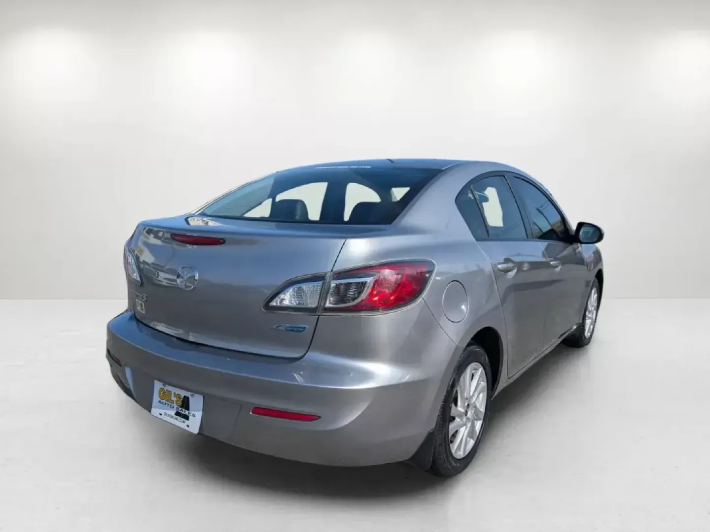 2013 Mazda Mazda3 i Grand Touring (JM1BL1W73D1) with an Gas I4 2.0L/122 engine, 6-Speed Automatic transmission, located at 3959 U.S. 80 W, Phenix City, AL, 36870, (334) 297-4885, 32.469296, -85.135185 - 2013 Mazda Mazda3 i Grand Touring - Photo#4