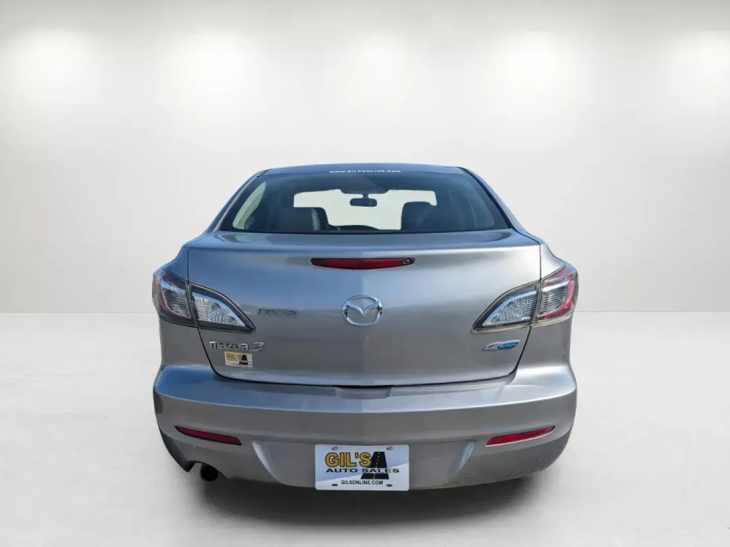 2013 Mazda Mazda3 i Grand Touring (JM1BL1W73D1) with an Gas I4 2.0L/122 engine, 6-Speed Automatic transmission, located at 3959 U.S. 80 W, Phenix City, AL, 36870, (334) 297-4885, 32.469296, -85.135185 - 2013 Mazda Mazda3 i Grand Touring - Photo#5