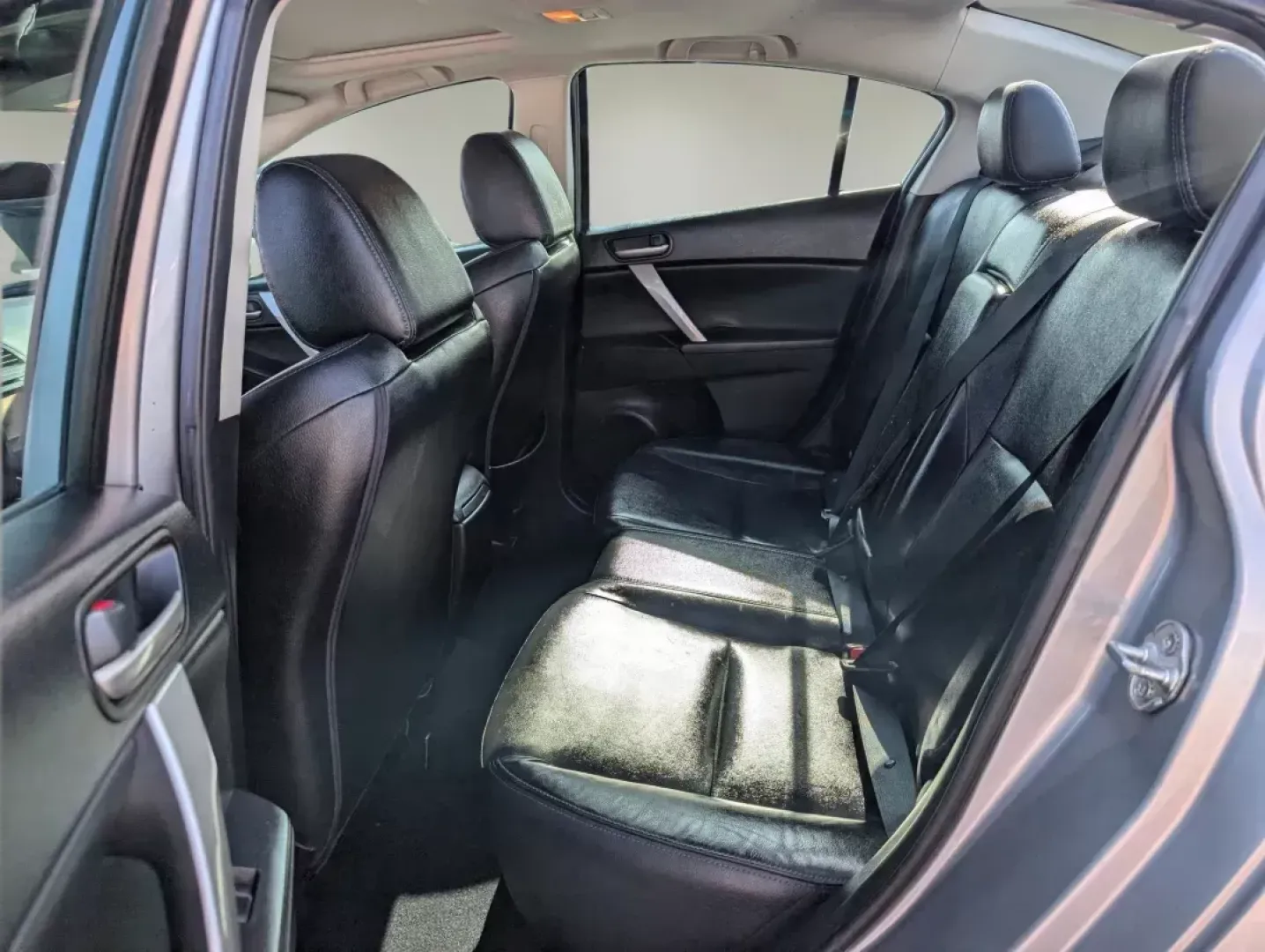 2013 Mazda Mazda3 i Grand Touring (JM1BL1W73D1) with an Gas I4 2.0L/122 engine, 6-Speed Automatic transmission, located at 3959 U.S. 80 W, Phenix City, AL, 36870, (334) 297-4885, 32.469296, -85.135185 - 2013 Mazda Mazda3 i Grand Touring - Photo#10