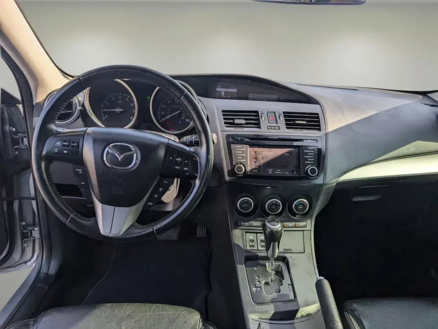 2013 Mazda Mazda3 i Grand Touring (JM1BL1W73D1) with an Gas I4 2.0L/122 engine, 6-Speed Automatic transmission, located at 3959 U.S. 80 W, Phenix City, AL, 36870, (334) 297-4885, 32.469296, -85.135185 - 2013 Mazda Mazda3 i Grand Touring - Photo#11