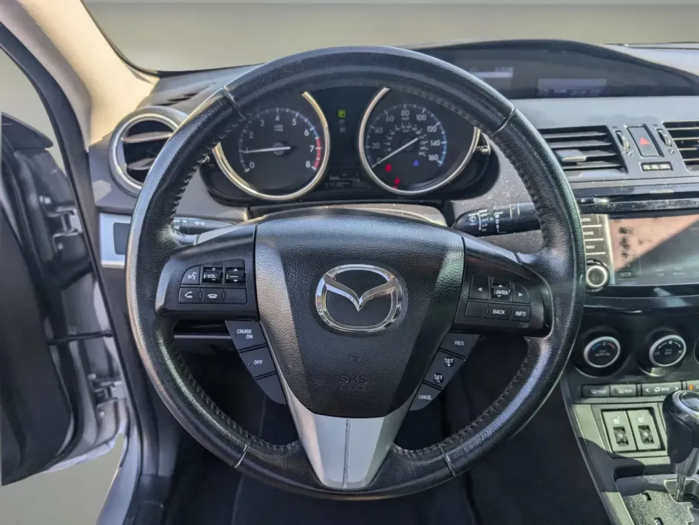 2013 Mazda Mazda3 i Grand Touring (JM1BL1W73D1) with an Gas I4 2.0L/122 engine, 6-Speed Automatic transmission, located at 3959 U.S. 80 W, Phenix City, AL, 36870, (334) 297-4885, 32.469296, -85.135185 - 2013 Mazda Mazda3 i Grand Touring - Photo#16
