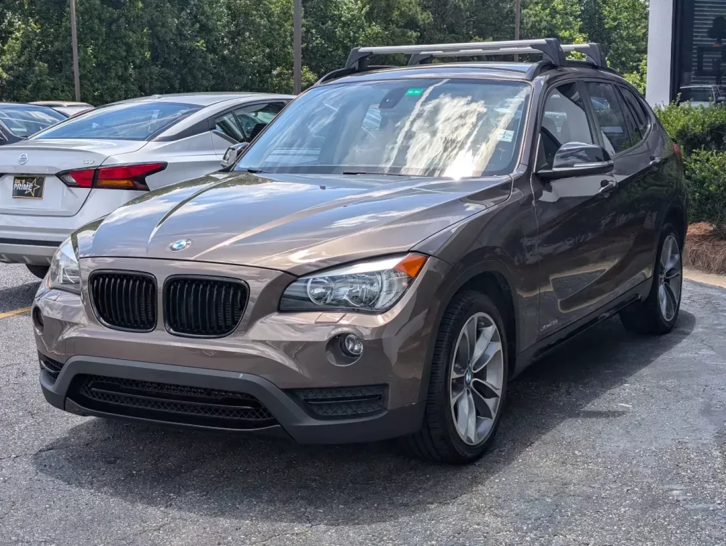 2014 BMW X1 xDrive28i (WBAVL1C56EV) with an Other engine, located at 3959 U.S. 80 W, Phenix City, AL, 36870, (334) 297-4885, 32.469296, -85.135185 - **Discover the Ultimate Blend of Style and Versatility with the 2014 BMW X1 xDrive28i at Gils Auto!**<br /> <br /> Are you in the market for a vehicle that's not just a mode of transport but a lifestyle upgrade? Whether you're navigating the daily hustle as a commuter, embarking on weekend adventure - Photo#1