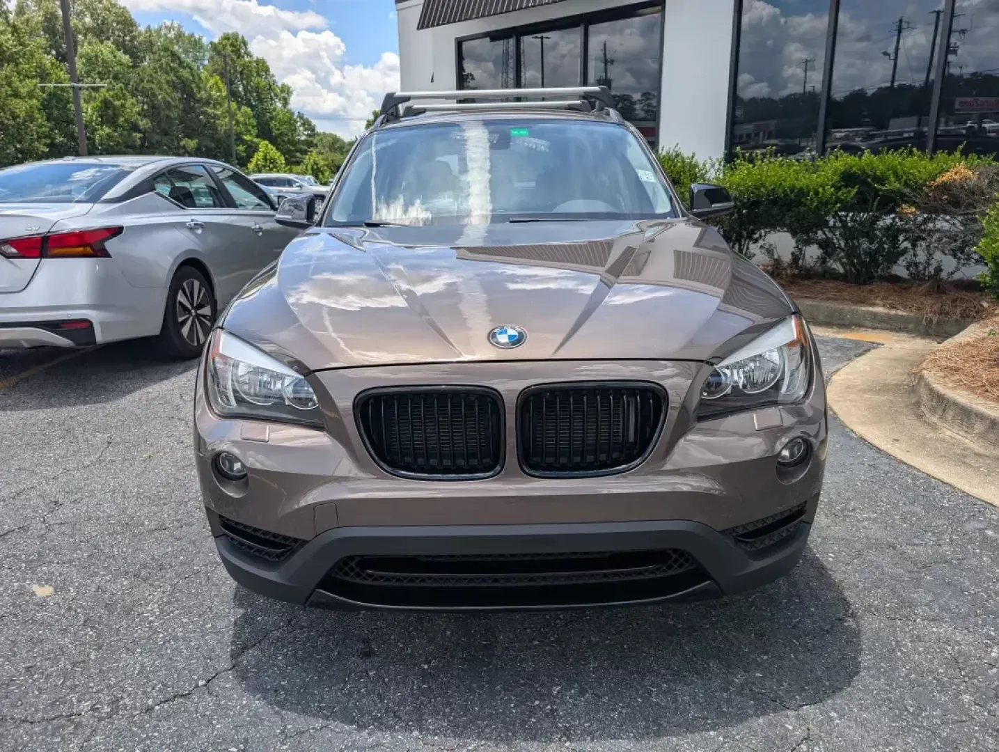 2014 BMW X1 xDrive28i (WBAVL1C56EV) with an Other engine, located at 3959 U.S. 80 W, Phenix City, AL, 36870, (334) 297-4885, 32.469296, -85.135185 - **Discover the Ultimate Blend of Style and Versatility with the 2014 BMW X1 xDrive28i at Gils Auto!**<br /> <br /> Are you in the market for a vehicle that's not just a mode of transport but a lifestyle upgrade? Whether you're navigating the daily hustle as a commuter, embarking on weekend adventure - Photo#2