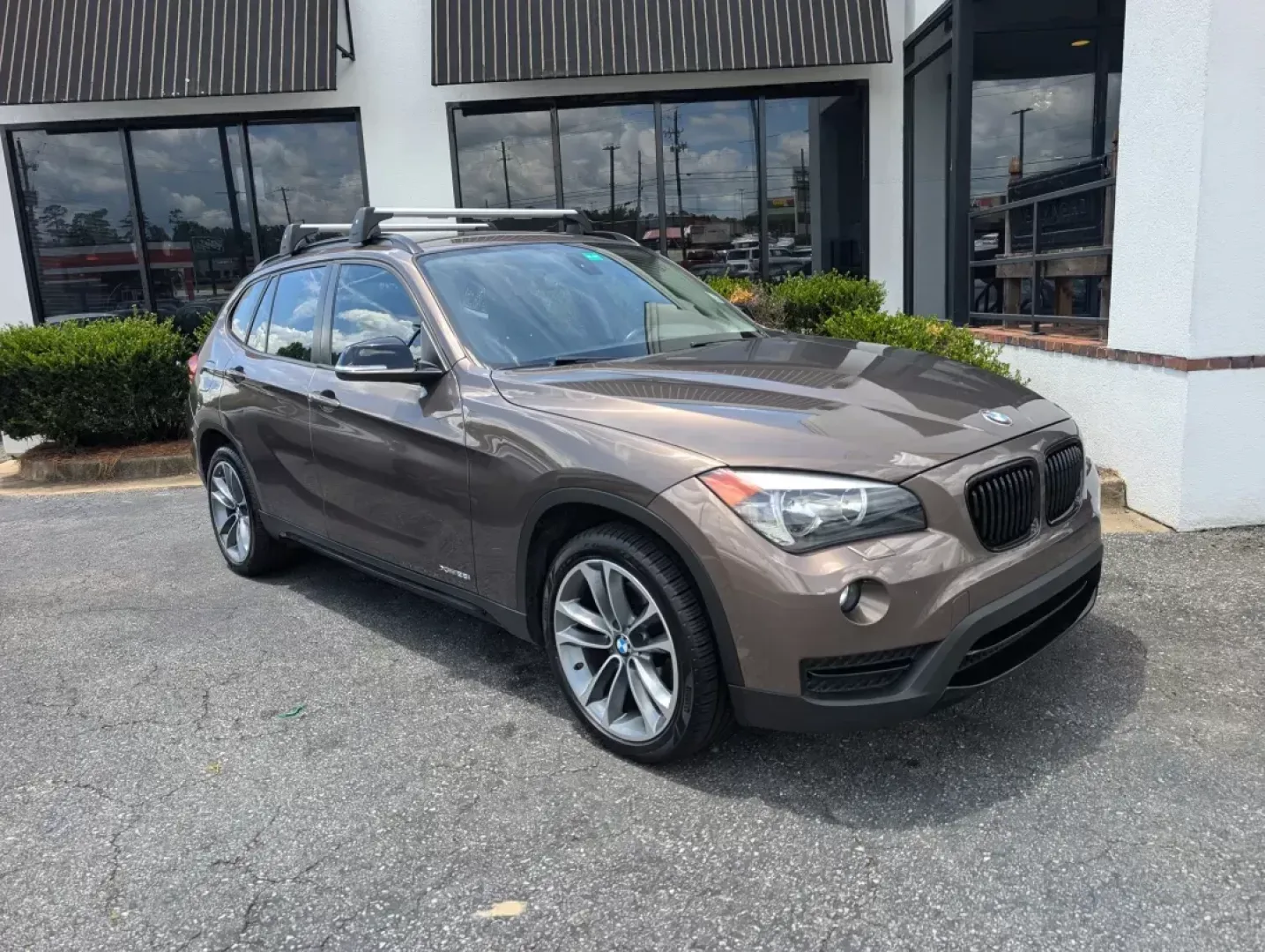 2014 BMW X1 xDrive28i (WBAVL1C56EV) with an Other engine, located at 3959 U.S. 80 W, Phenix City, AL, 36870, (334) 297-4885, 32.469296, -85.135185 - **Discover the Ultimate Blend of Style and Versatility with the 2014 BMW X1 xDrive28i at Gils Auto!**<br /> <br /> Are you in the market for a vehicle that's not just a mode of transport but a lifestyle upgrade? Whether you're navigating the daily hustle as a commuter, embarking on weekend adventure - Photo#3