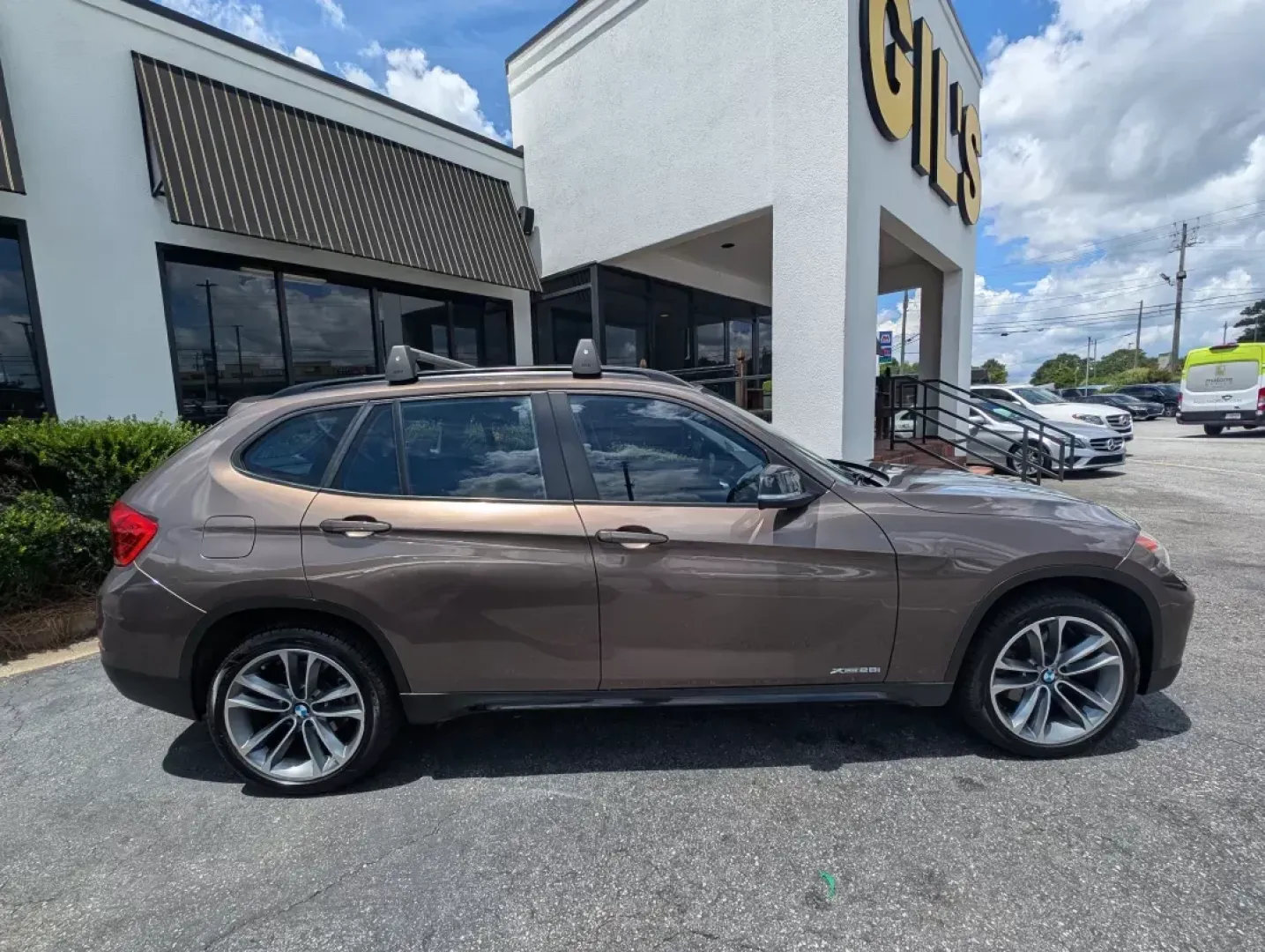 2014 BMW X1 xDrive28i (WBAVL1C56EV) with an Other engine, located at 3959 U.S. 80 W, Phenix City, AL, 36870, (334) 297-4885, 32.469296, -85.135185 - **Discover the Ultimate Blend of Style and Versatility with the 2014 BMW X1 xDrive28i at Gils Auto!**<br /> <br /> Are you in the market for a vehicle that's not just a mode of transport but a lifestyle upgrade? Whether you're navigating the daily hustle as a commuter, embarking on weekend adventure - Photo#4