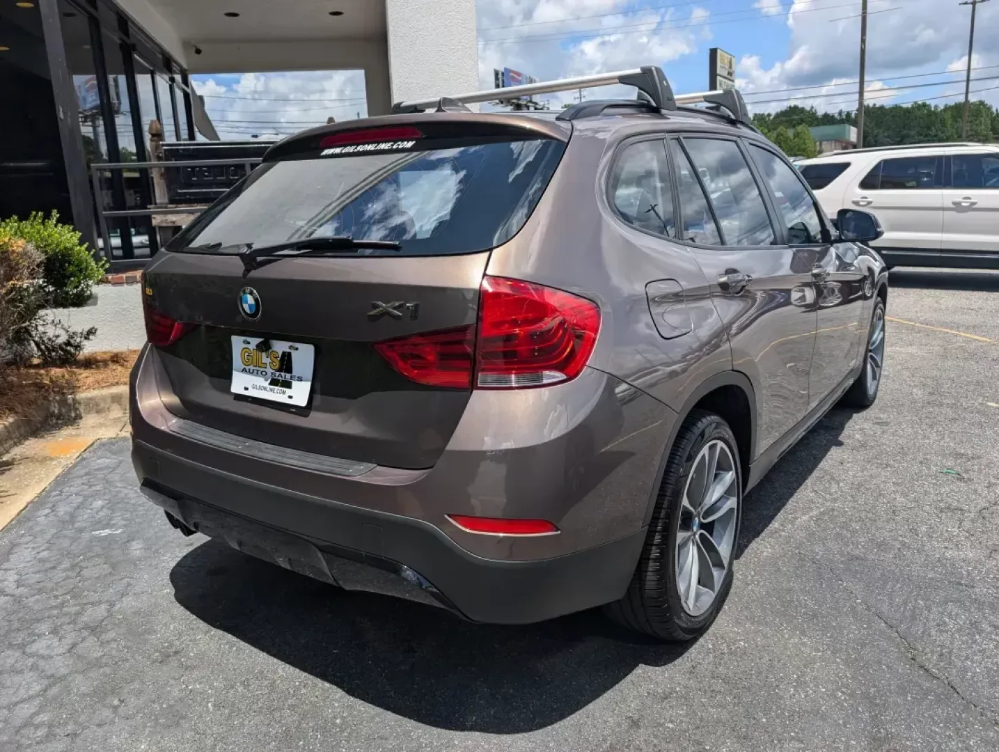 2014 BMW X1 xDrive28i (WBAVL1C56EV) with an Other engine, located at 3959 U.S. 80 W, Phenix City, AL, 36870, (334) 297-4885, 32.469296, -85.135185 - **Discover the Ultimate Blend of Style and Versatility with the 2014 BMW X1 xDrive28i at Gils Auto!**<br /> <br /> Are you in the market for a vehicle that's not just a mode of transport but a lifestyle upgrade? Whether you're navigating the daily hustle as a commuter, embarking on weekend adventure - Photo#5