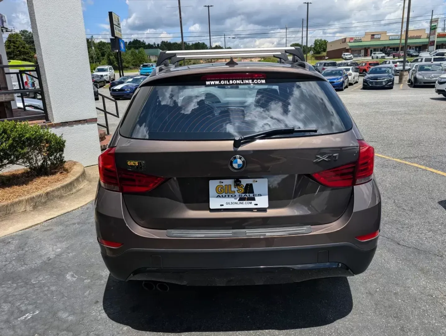 2014 BMW X1 xDrive28i (WBAVL1C56EV) with an Other engine, located at 3959 U.S. 80 W, Phenix City, AL, 36870, (334) 297-4885, 32.469296, -85.135185 - **Discover the Ultimate Blend of Style and Versatility with the 2014 BMW X1 xDrive28i at Gils Auto!**<br /> <br /> Are you in the market for a vehicle that's not just a mode of transport but a lifestyle upgrade? Whether you're navigating the daily hustle as a commuter, embarking on weekend adventure - Photo#6