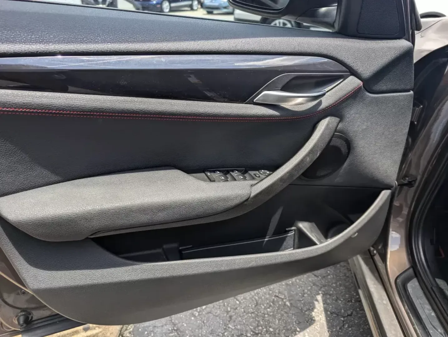 2014 BMW X1 xDrive28i (WBAVL1C56EV) with an Other engine, located at 3959 U.S. 80 W, Phenix City, AL, 36870, (334) 297-4885, 32.469296, -85.135185 - **Discover the Ultimate Blend of Style and Versatility with the 2014 BMW X1 xDrive28i at Gils Auto!**<br /> <br /> Are you in the market for a vehicle that's not just a mode of transport but a lifestyle upgrade? Whether you're navigating the daily hustle as a commuter, embarking on weekend adventure - Photo#9