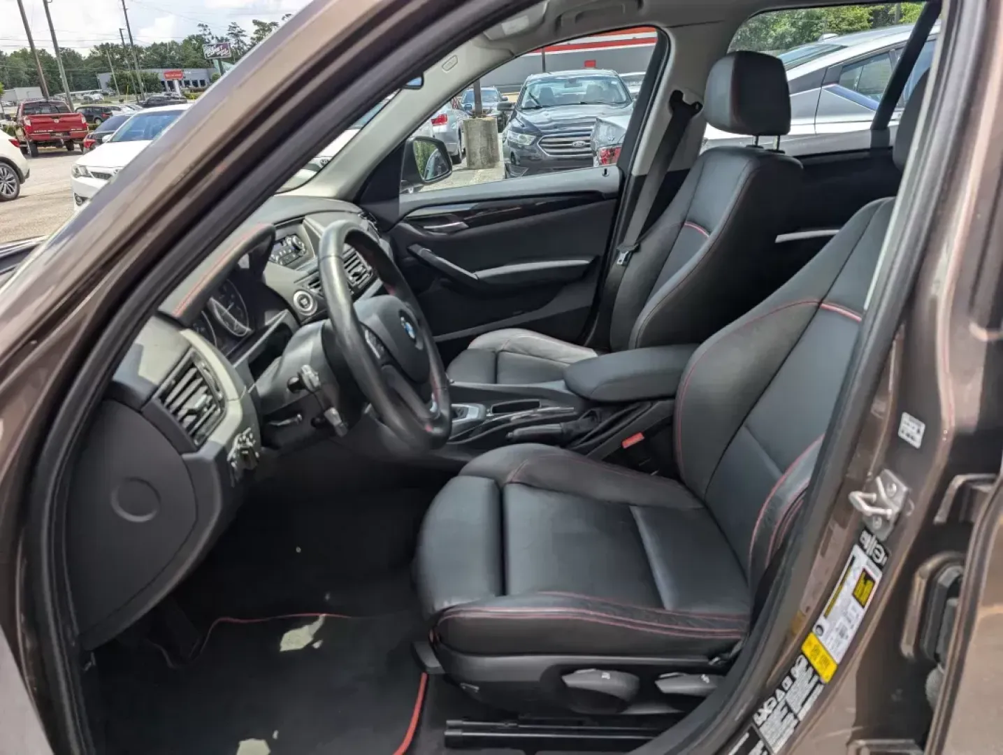 2014 BMW X1 xDrive28i (WBAVL1C56EV) with an Other engine, located at 3959 U.S. 80 W, Phenix City, AL, 36870, (334) 297-4885, 32.469296, -85.135185 - **Discover the Ultimate Blend of Style and Versatility with the 2014 BMW X1 xDrive28i at Gils Auto!**<br /> <br /> Are you in the market for a vehicle that's not just a mode of transport but a lifestyle upgrade? Whether you're navigating the daily hustle as a commuter, embarking on weekend adventure - Photo#10