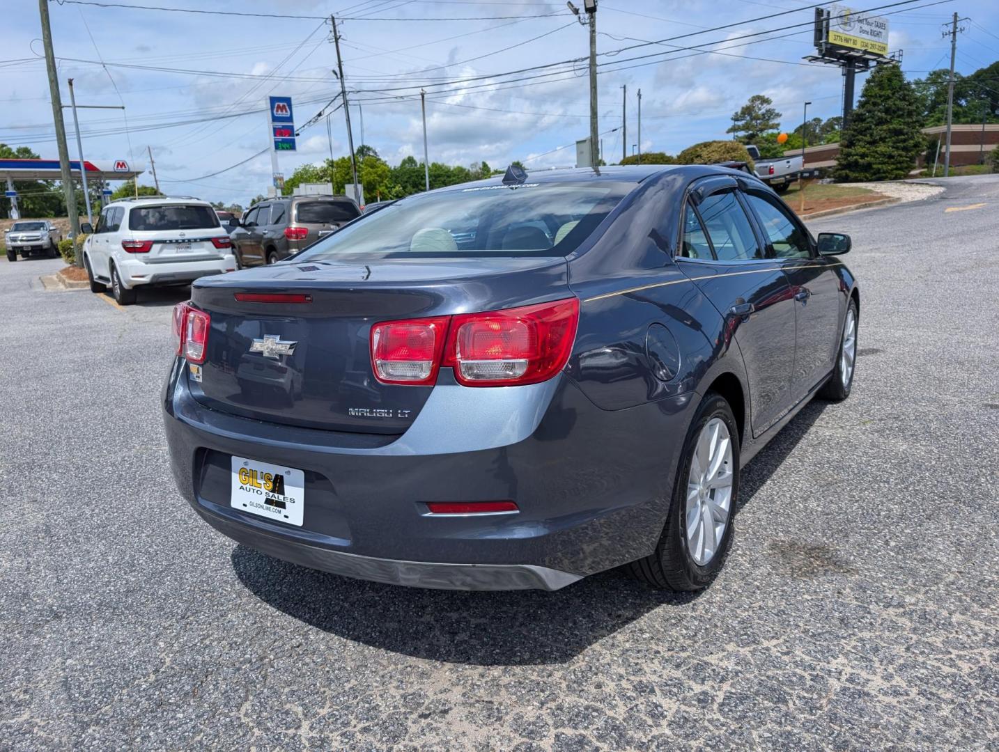 2014 /Cocoa/Light Neutral Chevrolet Malibu LT (1G11E5SL9EF) with an Gas I4 2.5L/150 engine, 6-Speed Automatic transmission, located at 3959 U.S. 80 W, Phenix City, AL, 36870, (334) 297-4885, 32.469296, -85.135185 - 2014 Chevrolet Malibu LT - Photo#4