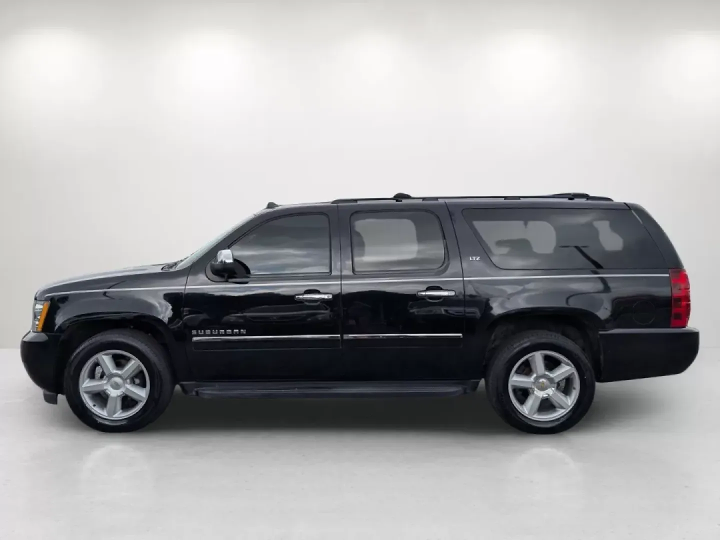 2014 /Ebony Chevrolet Suburban LTZ (1GNSCKE00ER) with an Other engine, located at 1430 Gateway Drive, Opelika, AL, 36801, (334) 239-0944, 32.637871, -85.409790 - Experience the ultimate in family adventure with the 2014 Chevrolet Suburban LTZ, available now at Gils Auto in Phenix City, Alabama. This spacious SUV is designed for those who seek comfort and style, making it perfect for growing families, weekend getaways, or long commutes. With ample seating for - Photo#7
