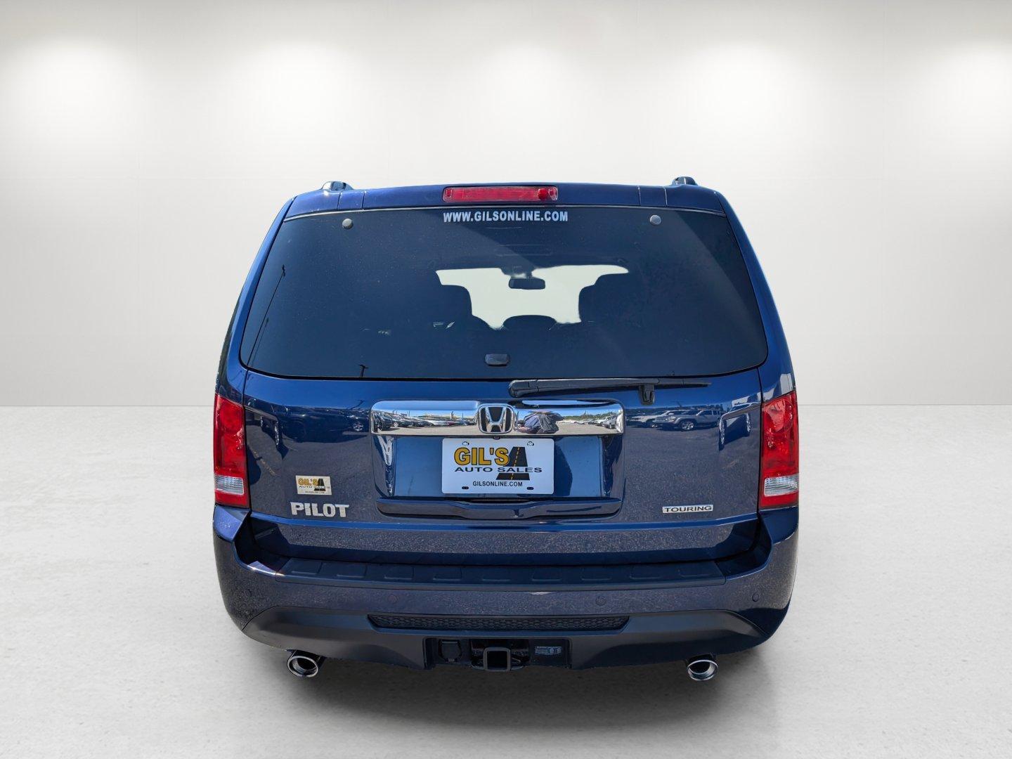 2014 Honda Pilot Touring (5FNYF3H99EB) with an Regular Unleaded V-6 3.5 L/212 engine, 5-Speed Automatic w/OD transmission, located at 7000 Northlake Connector, Columbus, GA, 31904, (706) 987-8085, 32.524975, -84.978134 - 2014 Honda Pilot Touring - Photo#5