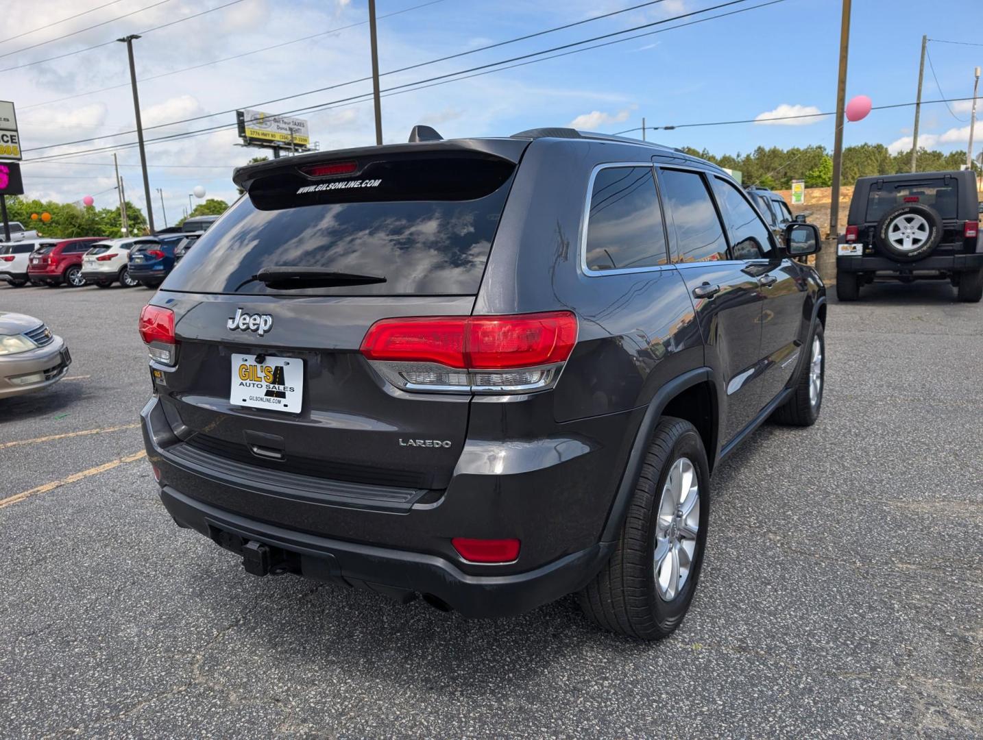 2014 /Black Jeep Grand Cherokee Laredo (1C4RJEAG1EC) with an Regular Unleaded V-6 3.6 L/220 engine, 8-Speed Automatic w/OD transmission, located at 3959 U.S. 80 W, Phenix City, AL, 36870, (334) 297-4885, 32.469296, -85.135185 - 2014 Jeep Grand Cherokee Laredo - Photo#4