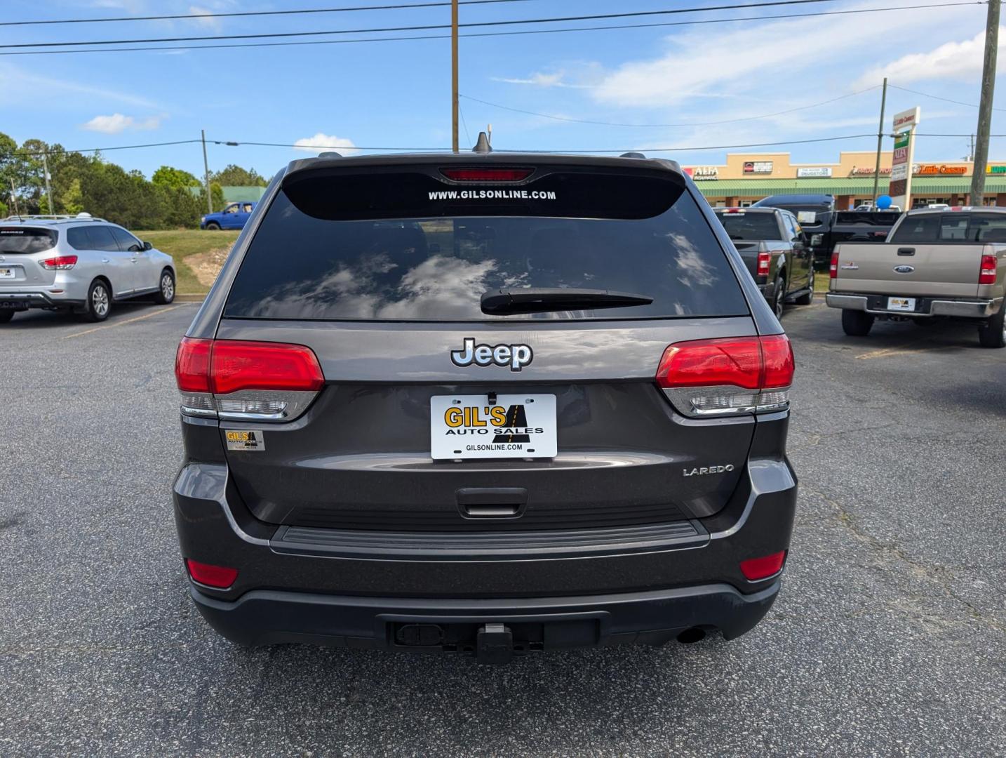 2014 /Black Jeep Grand Cherokee Laredo (1C4RJEAG1EC) with an Regular Unleaded V-6 3.6 L/220 engine, 8-Speed Automatic w/OD transmission, located at 3959 U.S. 80 W, Phenix City, AL, 36870, (334) 297-4885, 32.469296, -85.135185 - 2014 Jeep Grand Cherokee Laredo - Photo#5