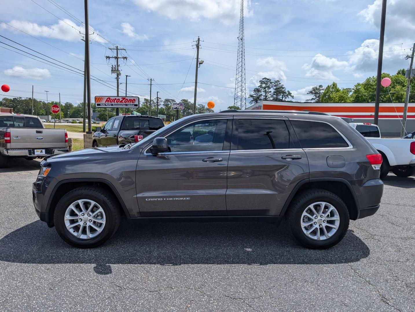 2014 /Black Jeep Grand Cherokee Laredo (1C4RJEAG1EC) with an Regular Unleaded V-6 3.6 L/220 engine, 8-Speed Automatic w/OD transmission, located at 3959 U.S. 80 W, Phenix City, AL, 36870, (334) 297-4885, 32.469296, -85.135185 - 2014 Jeep Grand Cherokee Laredo - Photo#7