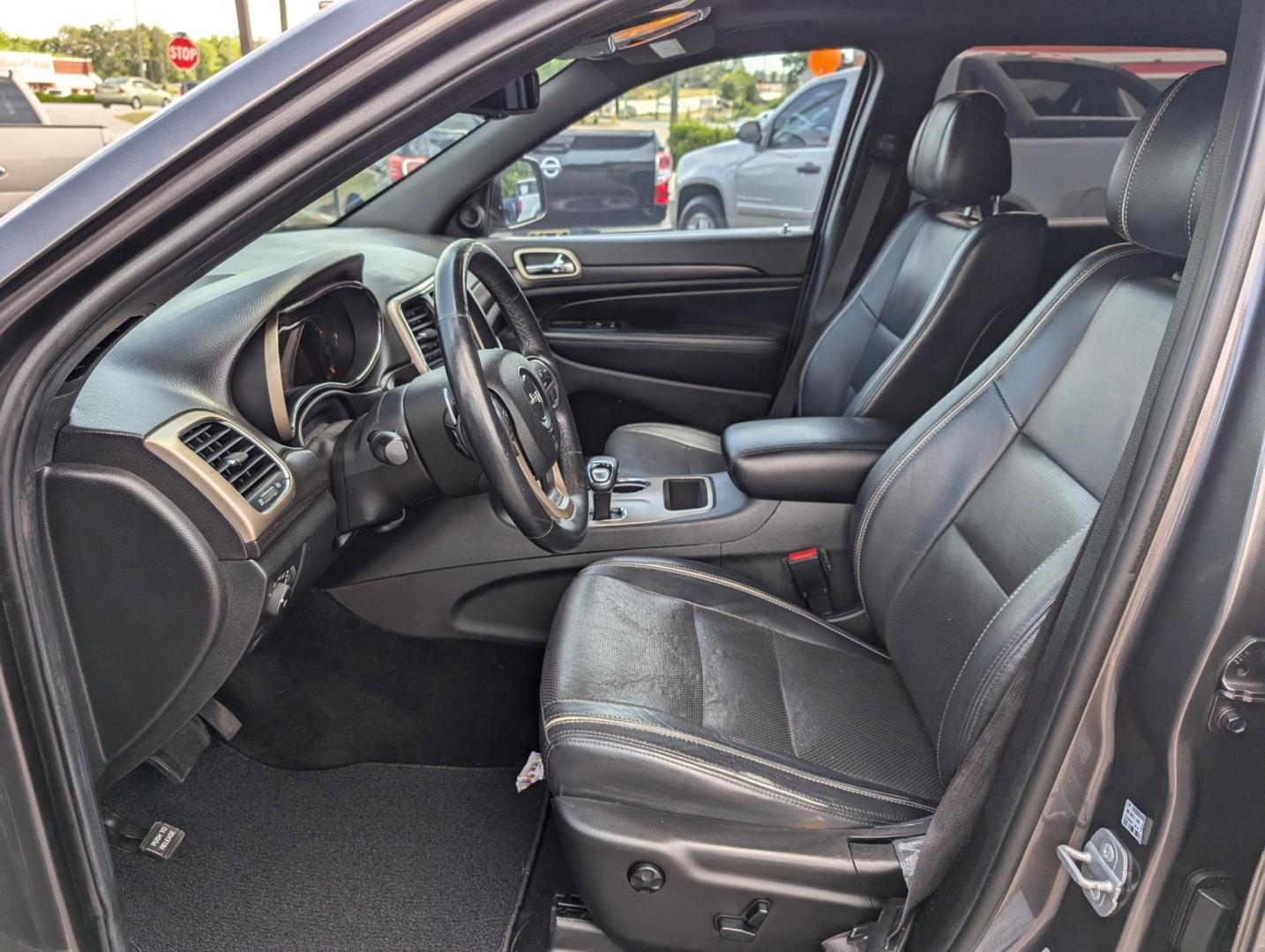 2014 /Black Jeep Grand Cherokee Laredo (1C4RJEAG1EC) with an Regular Unleaded V-6 3.6 L/220 engine, 8-Speed Automatic w/OD transmission, located at 3959 U.S. 80 W, Phenix City, AL, 36870, (334) 297-4885, 32.469296, -85.135185 - 2014 Jeep Grand Cherokee Laredo - Photo#9