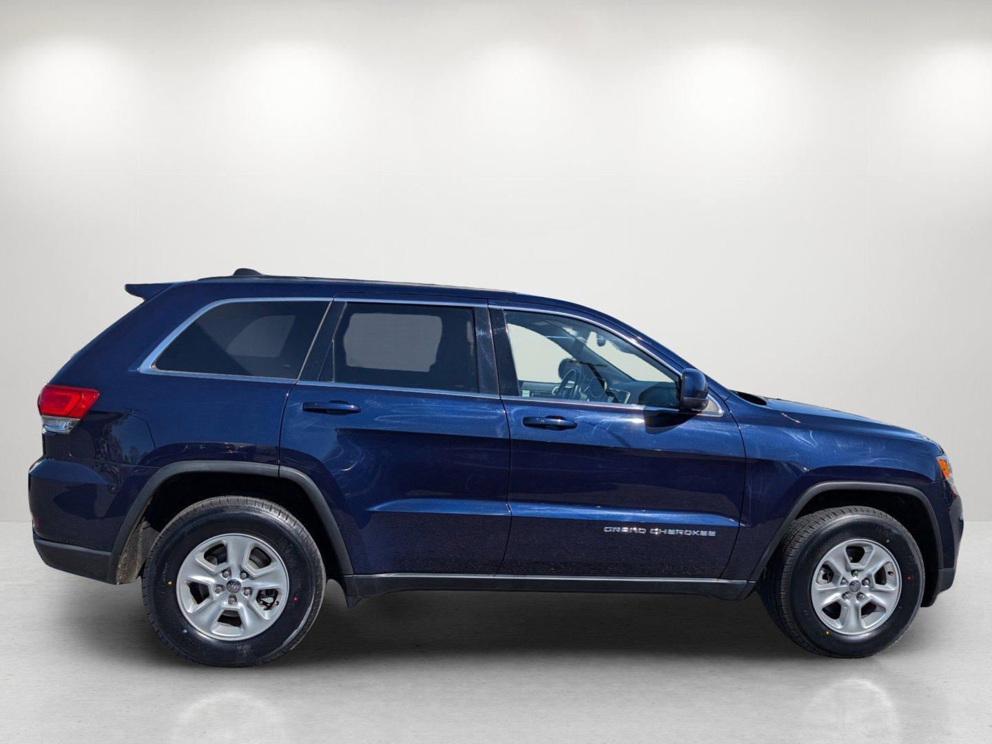 2014 /Black Jeep Grand Cherokee Laredo (1C4RJEAG2EC) with an Regular Unleaded V-6 3.6 L/220 engine, 8-Speed Automatic w/OD transmission, located at 5115 14th Ave., Columbus, GA, 31904, (706) 323-0345, 32.511494, -84.971046 - 2014 Jeep Grand Cherokee Laredo - Photo#4