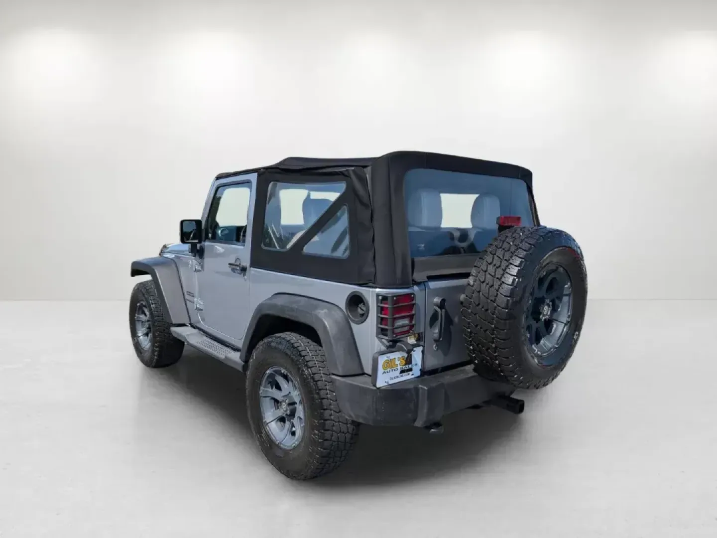 2014 /Black Jeep Wrangler Sport (1C4AJWAG7EL) with an Regular Unleaded V-6 3.6 L/220 engine, 5-Speed Automatic w/OD transmission, located at 1430 Gateway Drive, Opelika, AL, 36801, (334) 239-0944, 32.637871, -85.409790 - 2014 Jeep Wrangler Sport - Photo#6