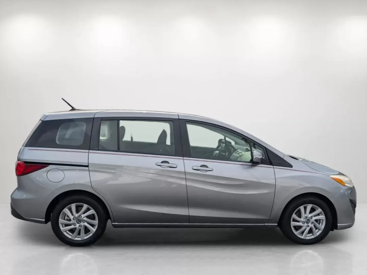 2014 /Black Mazda Mazda5 Sport (JM1CW2BL8E0) with an Other engine, located at 804 22nd Ave, Phenix City, AL, 36870, (334) 297-1860, 32.484749, -85.024475 - **Experience Versatility with the 2014 Mazda5 Sport at Gils Auto - Columbus #2!**<br /> <br /> Are you ready to elevate your lifestyle with a vehicle that adapts to your family's needs, weekend adventures, and daily commutes? Look no further! The 2014 Mazda5 Sport is your perfect companion for life - Photo#3